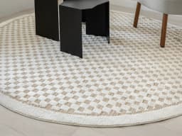Milo Sandy carpet in sandy and beige, shown in a lifestyle close-up front view