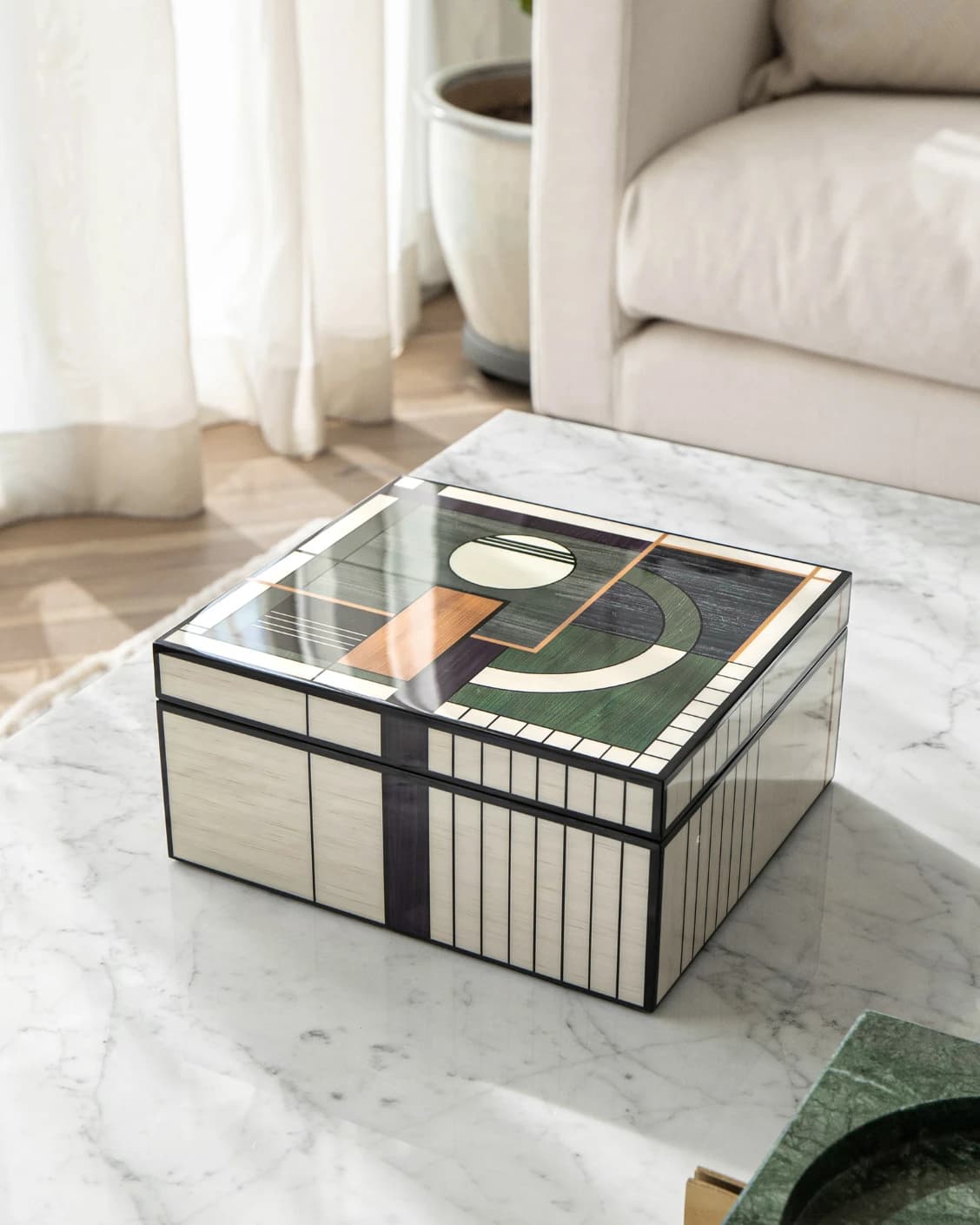 Miro Cornell accessory in black and beige, shown in a product top view as image 2