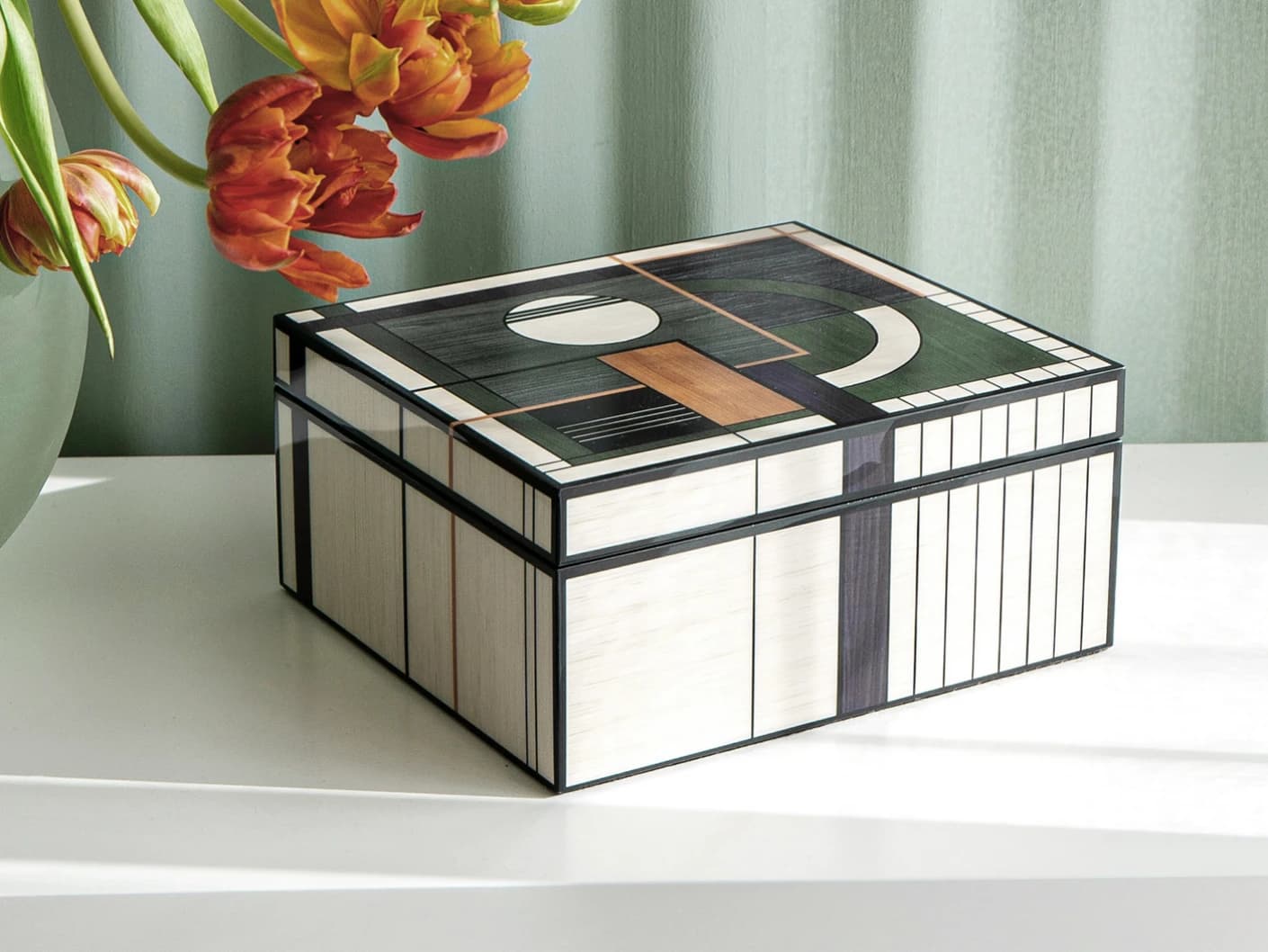 Miro Cornell accessory in black and beige, shown in a lifestyle left view