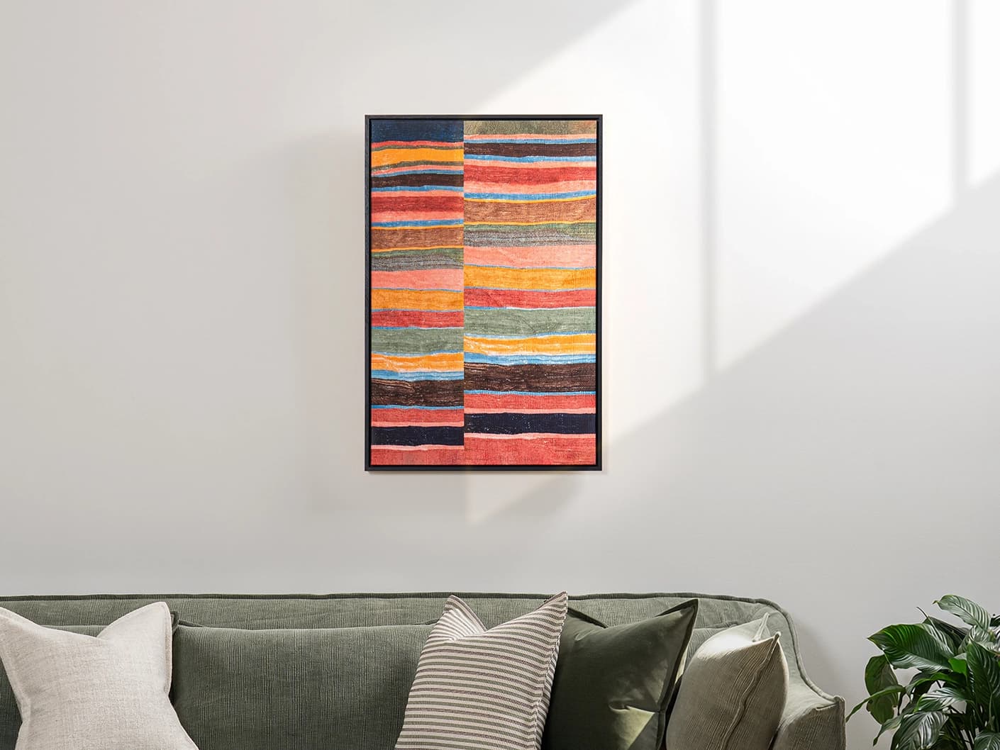 Misfits canvas artwork in multicolour, shown in a lifestyle front view