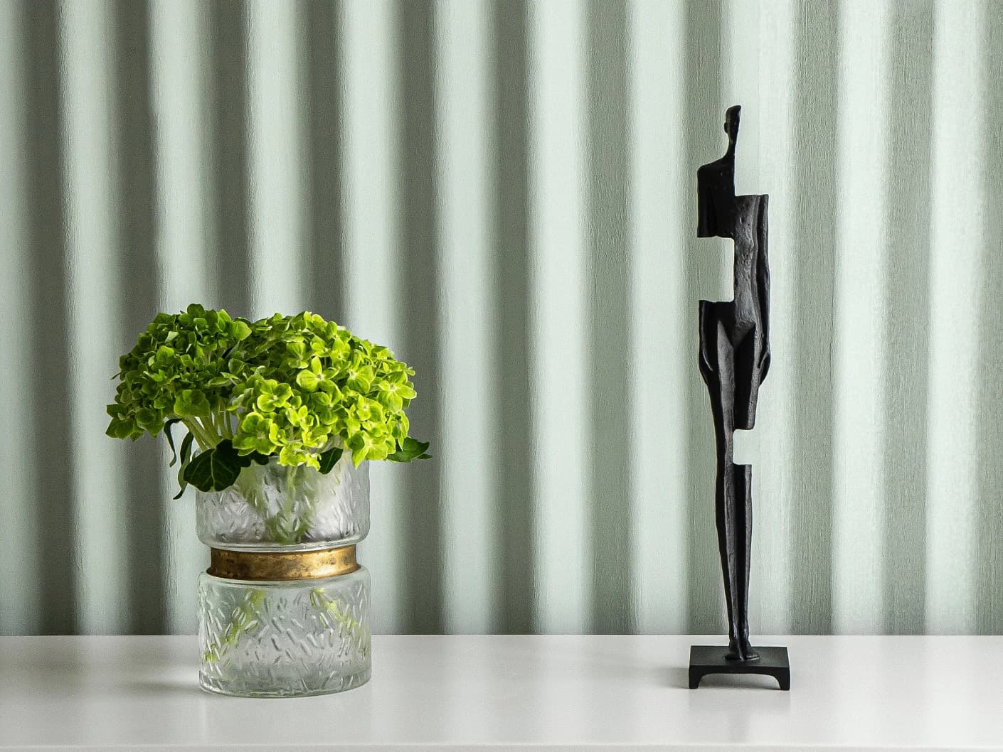 Morgan Rodin statues and sculptures in black, shown in a lifestyle front view