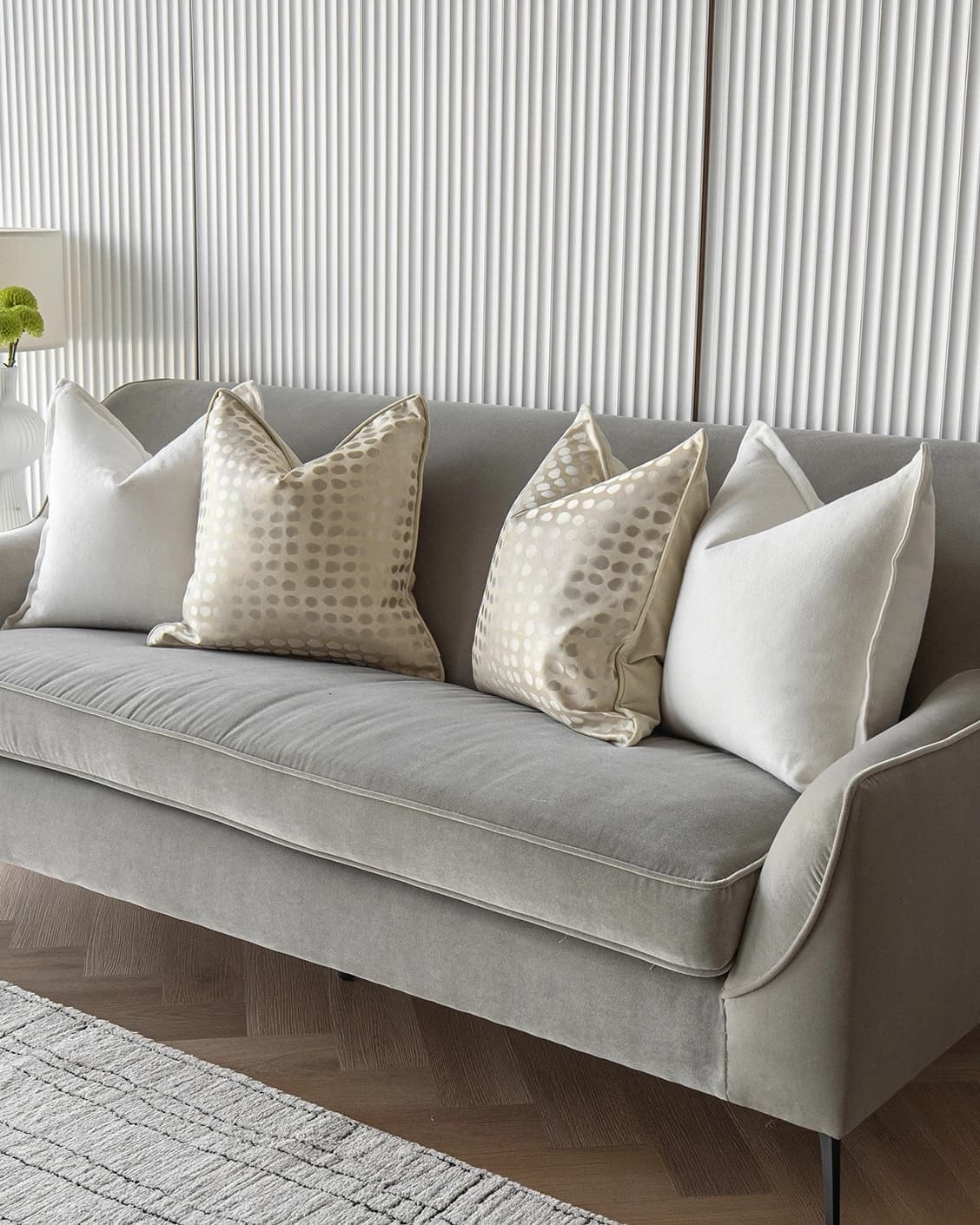 Myla Bundle cushion in white, beige and gold, shown in a lifestyle right view as image 2