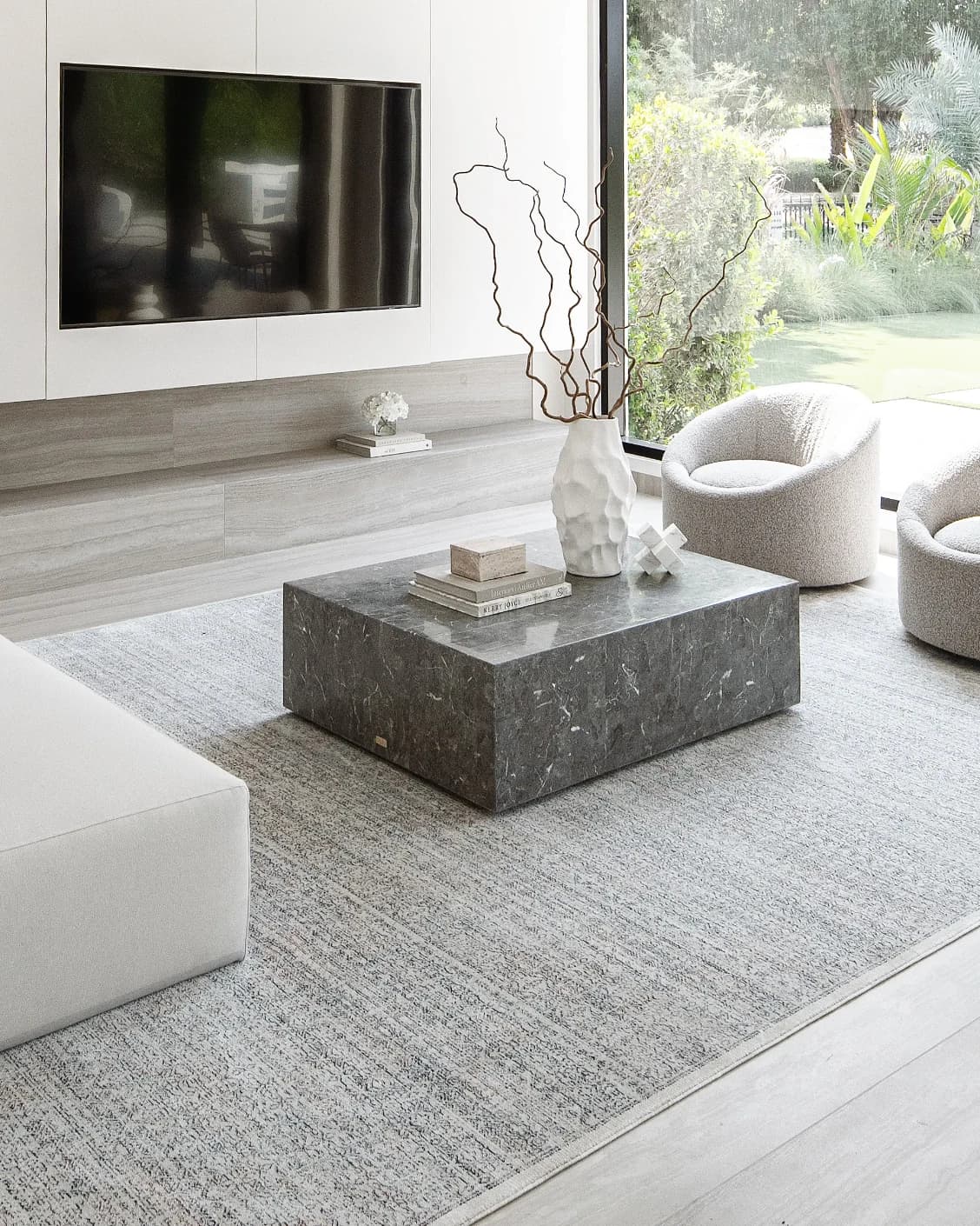 Natalia Azure carpet in blue and grey, shown in a lifestyle left view as image 6