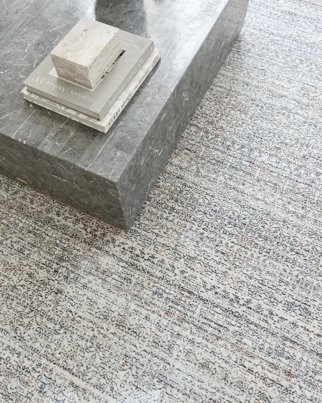 Natalia Azure carpet in blue and grey, shown in a lifestyle top view as image 9