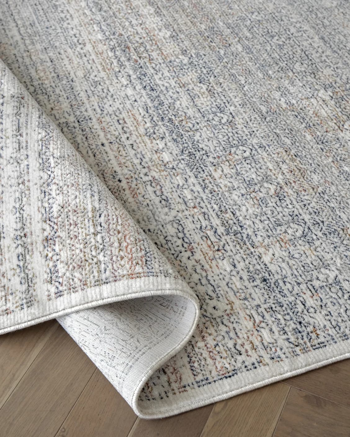 Natalia Azure carpet in blue and grey, shown in a product close-up as image 10