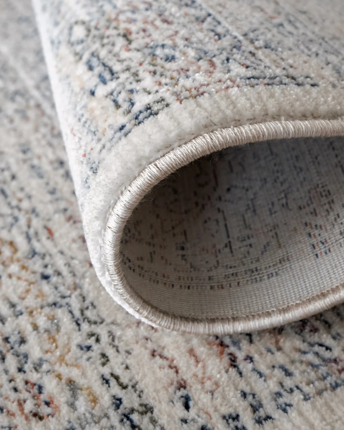 Natalia Azure carpet in blue and grey, shown in a product close-up as image 11