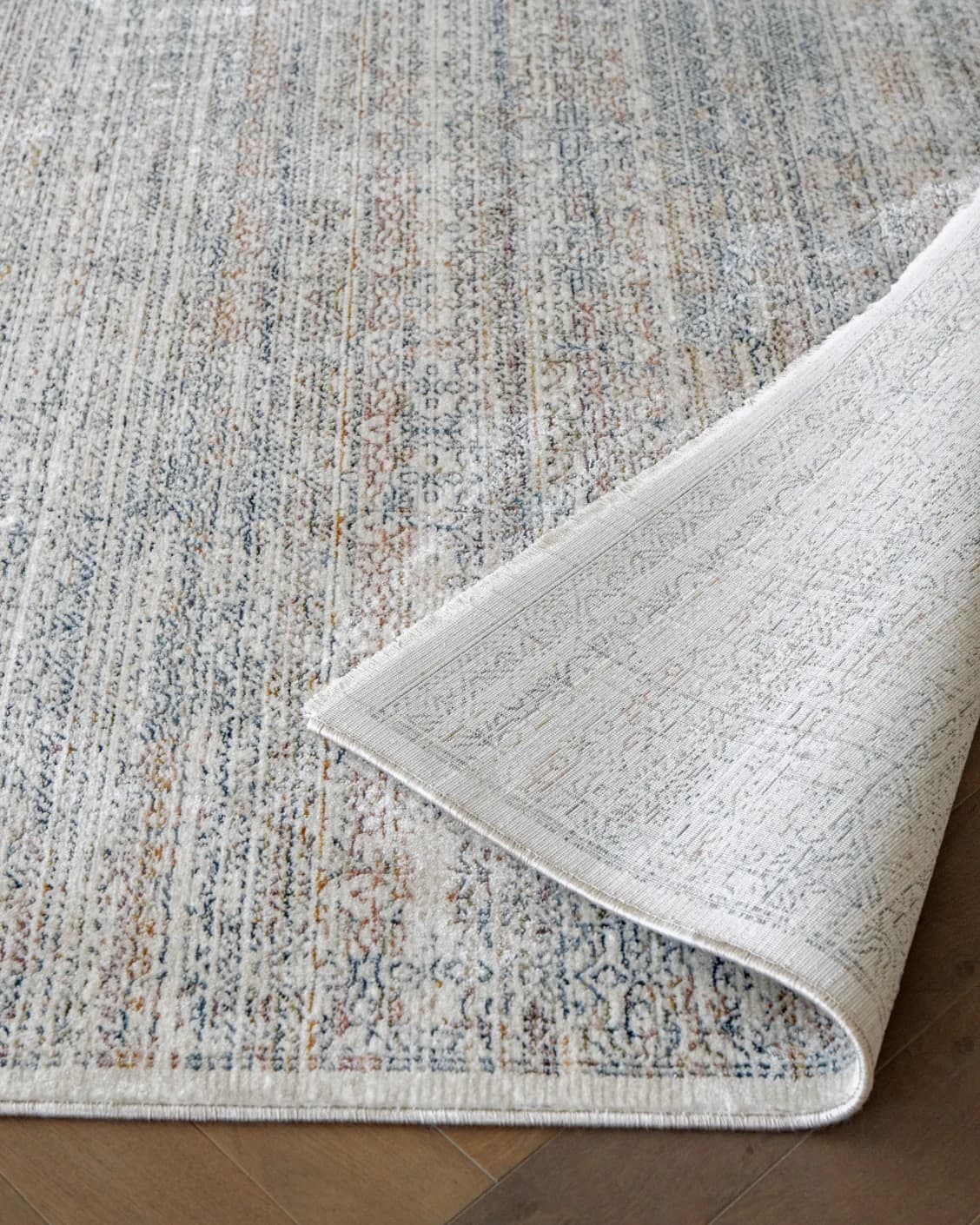 Natalia Azure carpet in blue and grey, shown in a product close-up as image 12