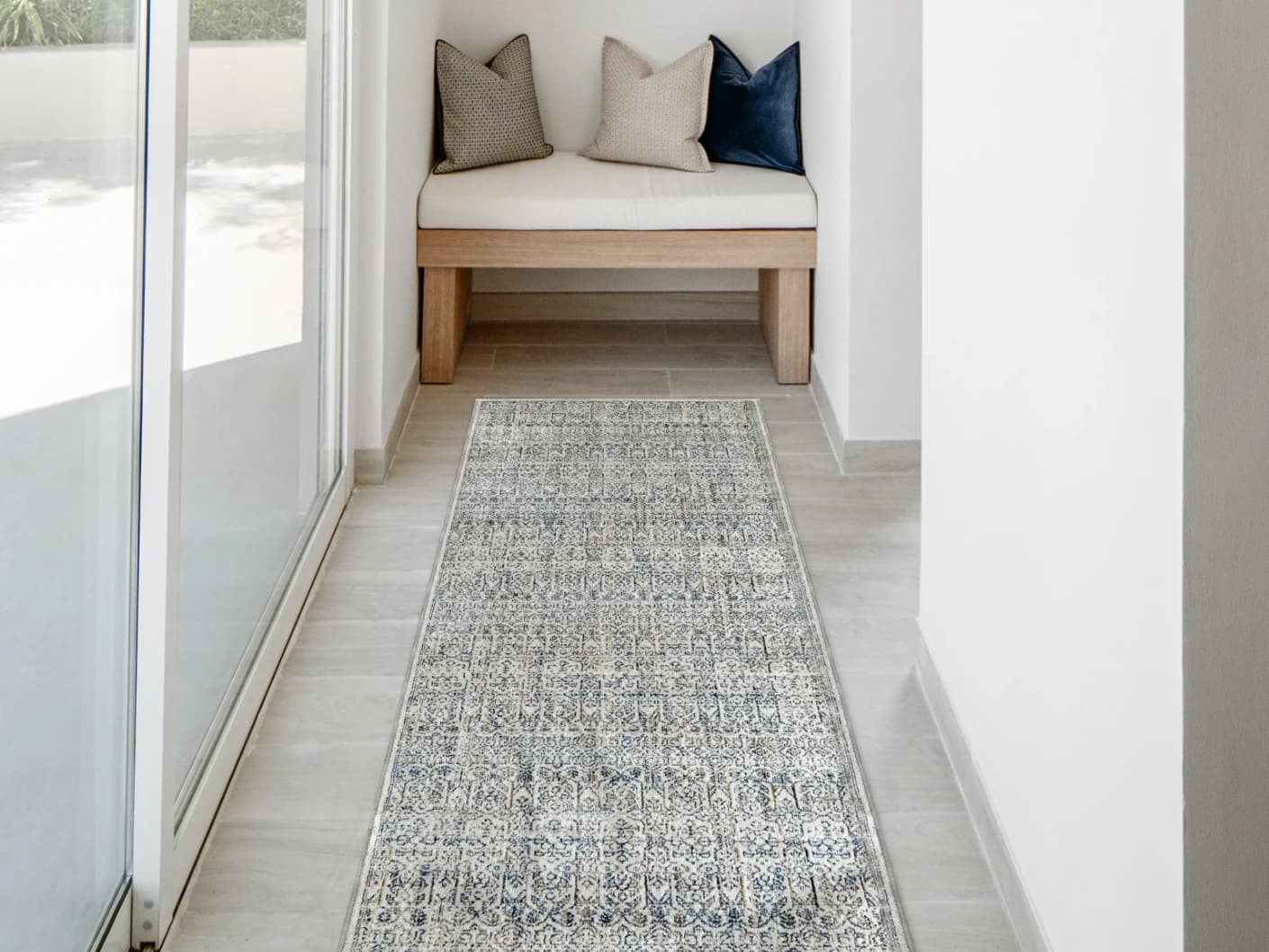 Natalia Azure Runners carpet in blue and grey, shown in a lifestyle front view