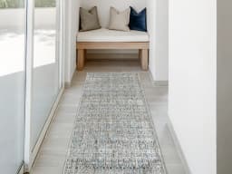 Natalia Azure Runners carpet in blue and grey, shown in a lifestyle front view