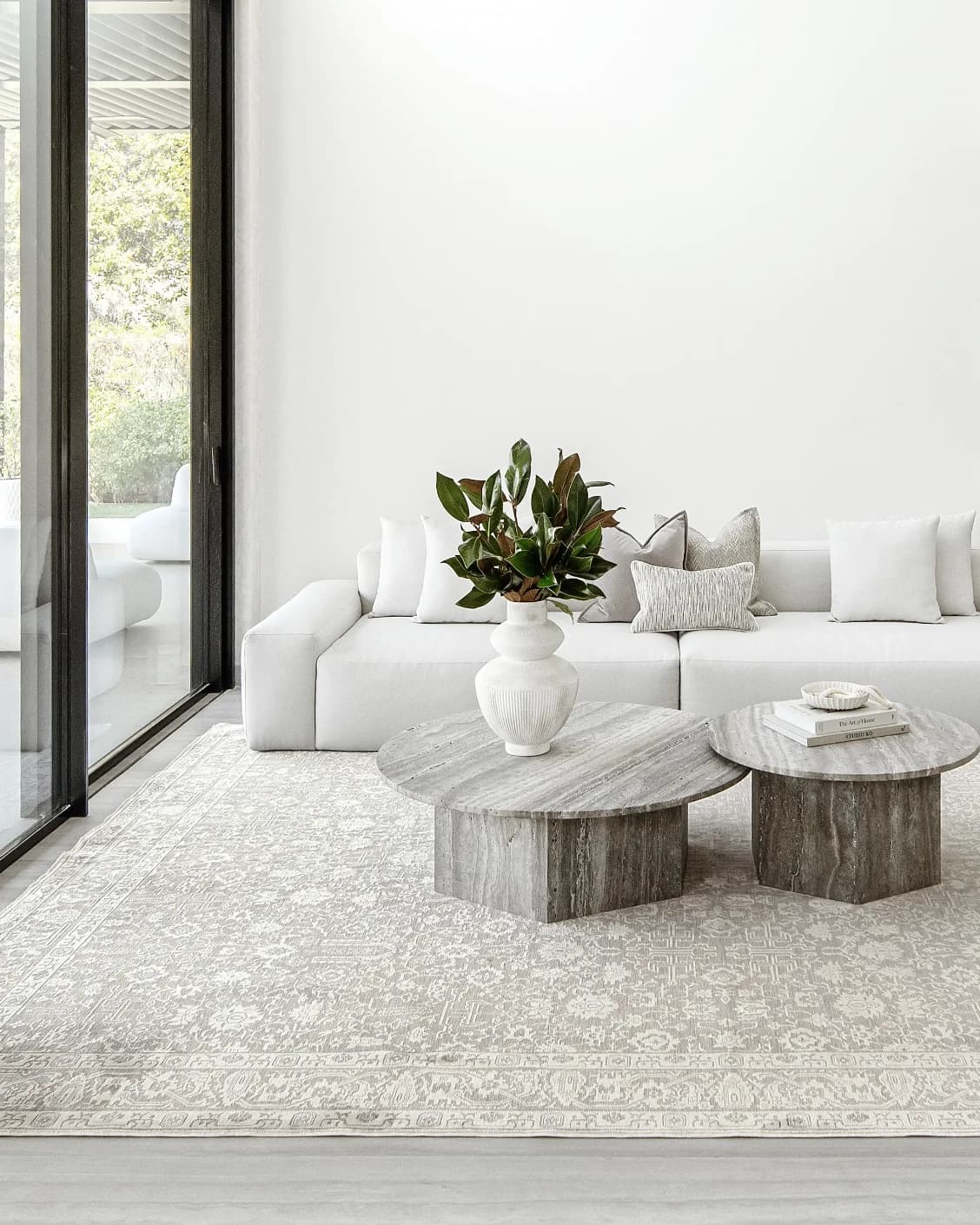 Natalia Sandy carpet in beige and grey, shown in a lifestyle front view as image 4