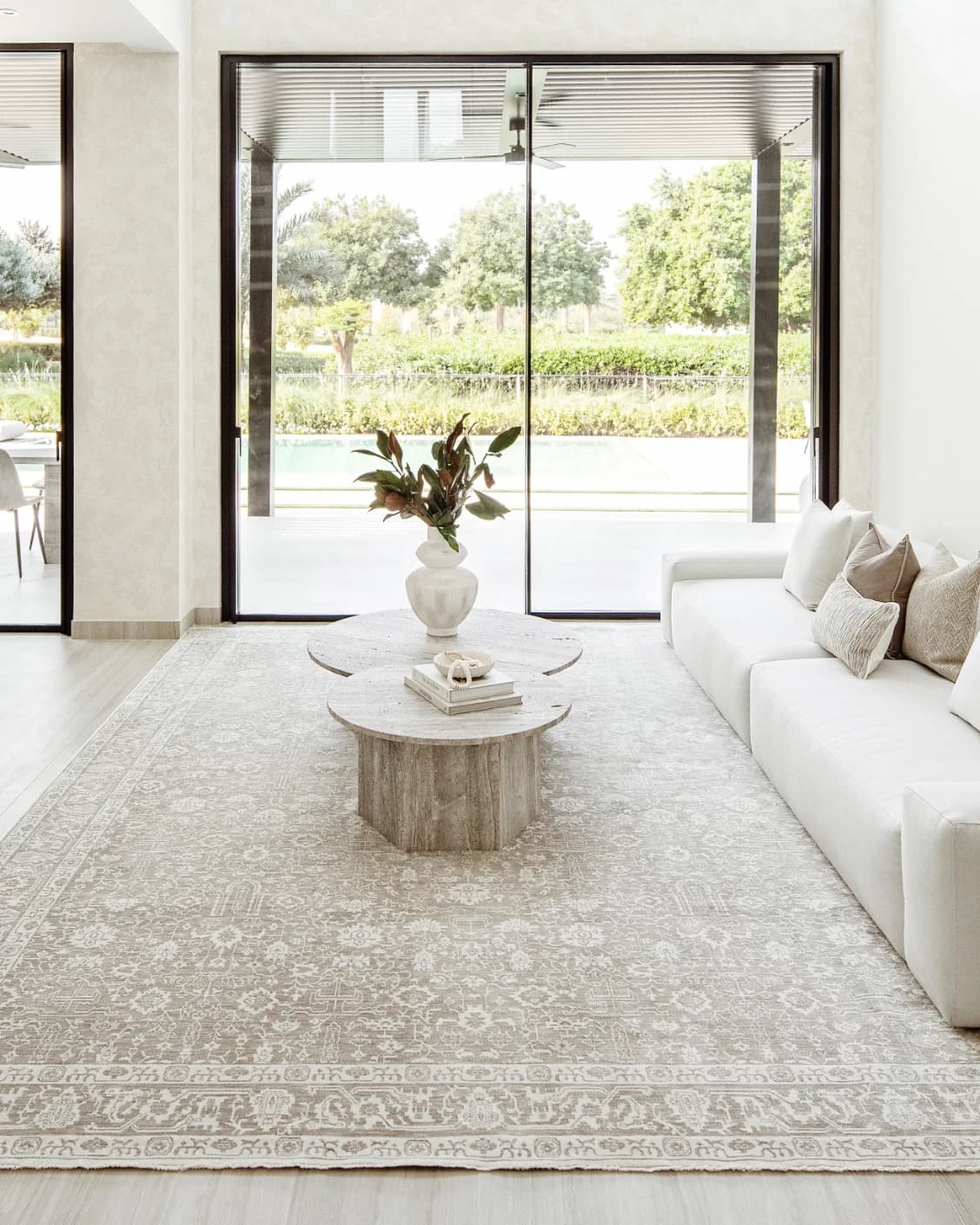 Natalia Sandy carpet in beige and grey, shown in a lifestyle front view as image 6