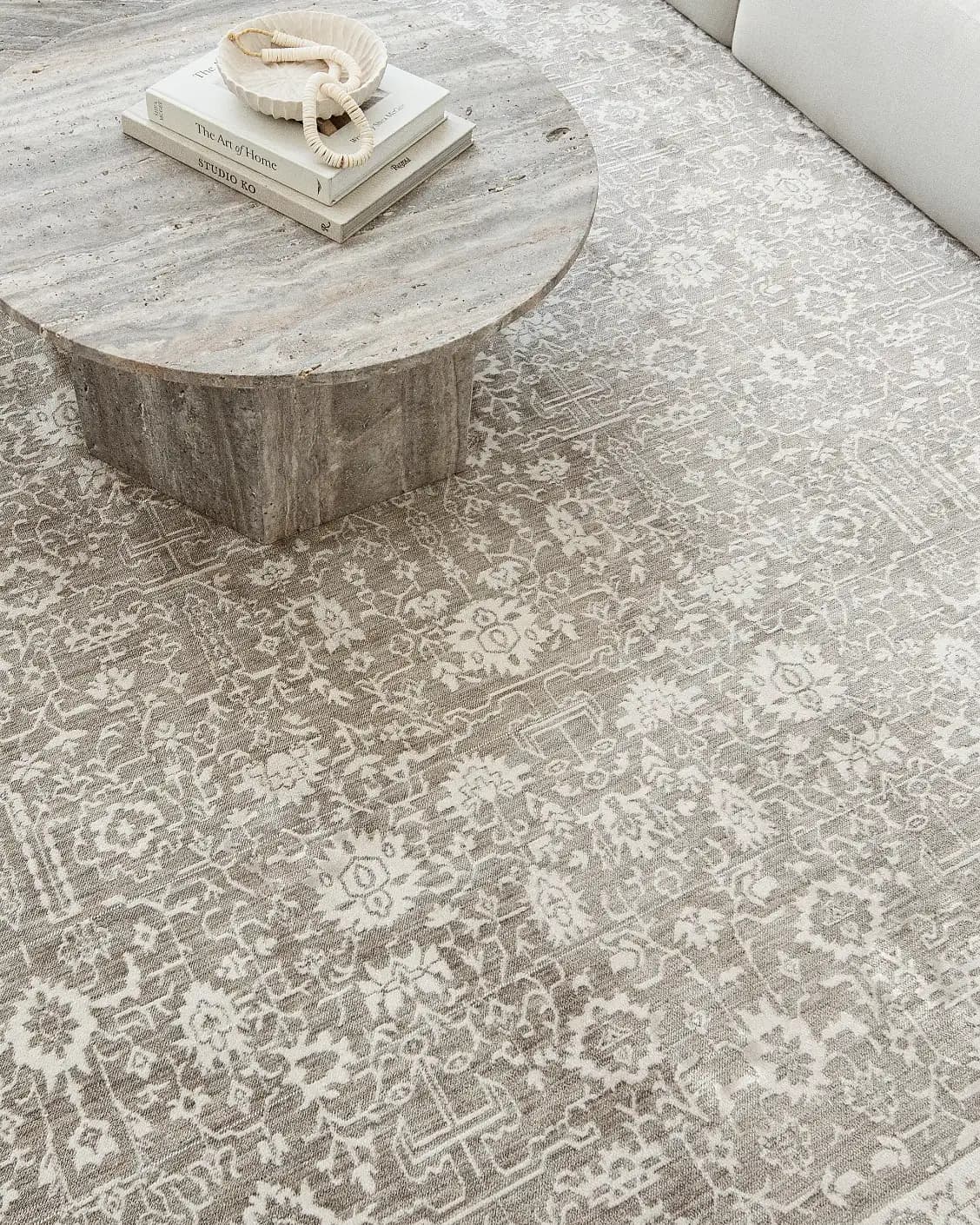 Natalia Sandy carpet in beige and grey, shown in a lifestyle top view as image 8