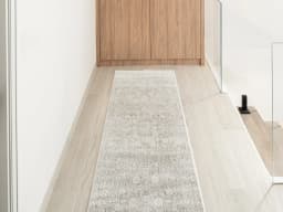 Natalia Sandy Runners carpet in beige and grey, shown in a lifestyle front view