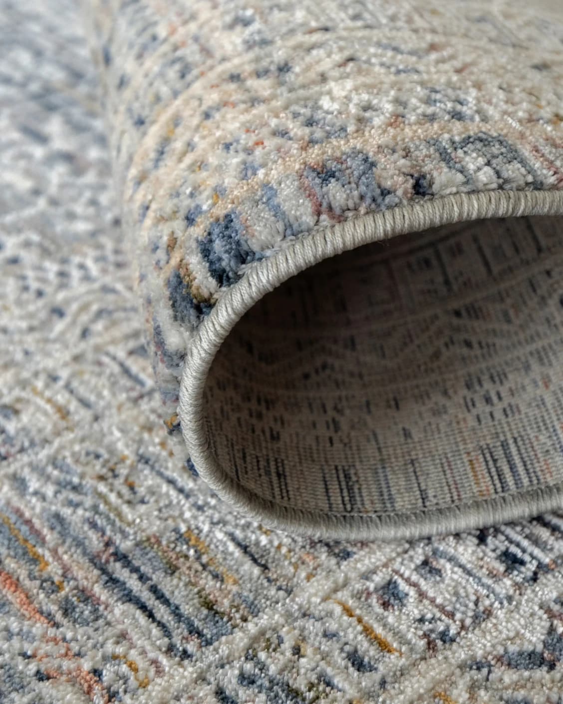 Natalia Sky carpet in blue, shown in a lifestyle close-up as image 4
