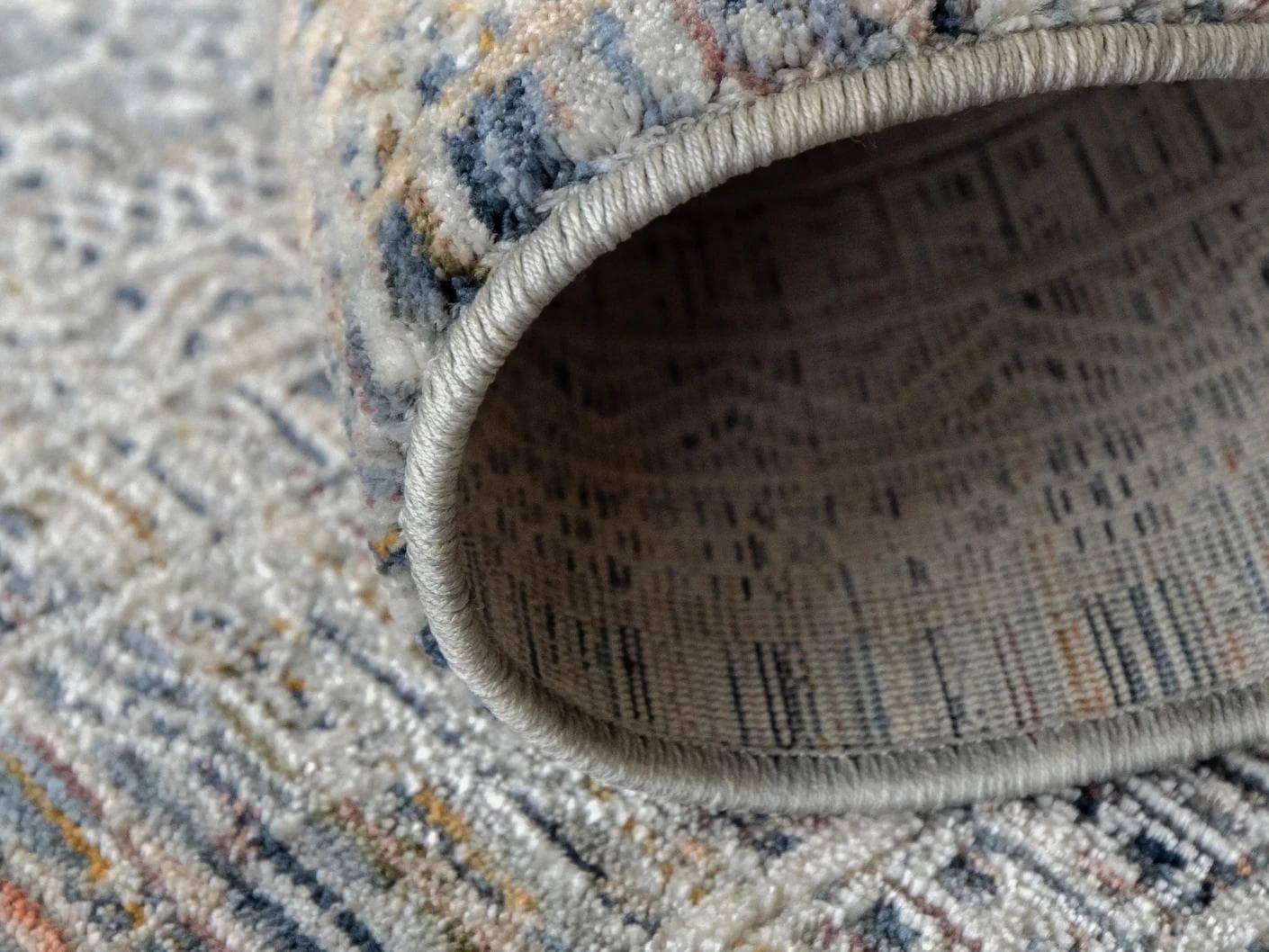 Natalia Sky carpet in blue, shown in a lifestyle close-up as image 4