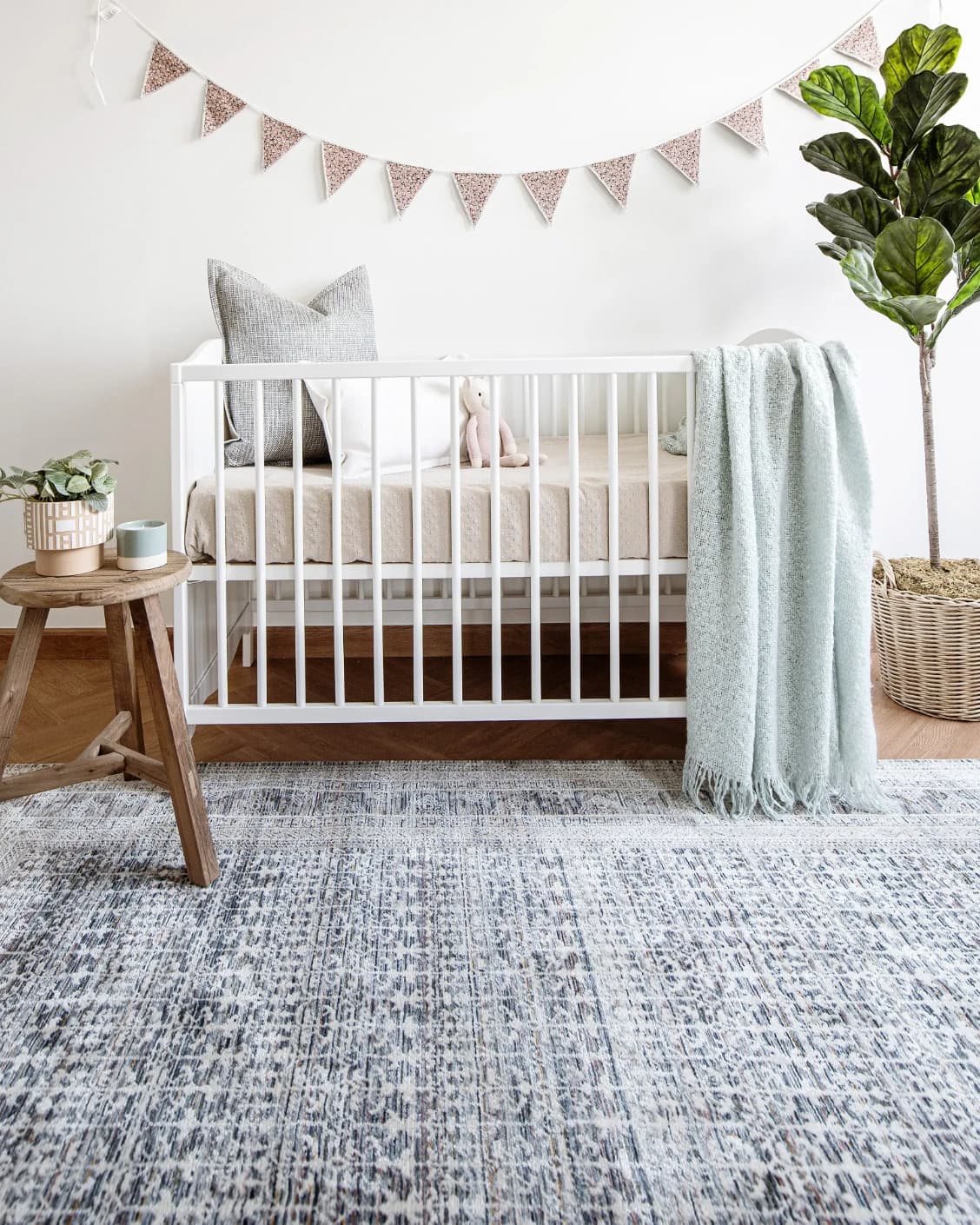 Natalia Sky carpet in blue, shown in a lifestyle front view as image 6