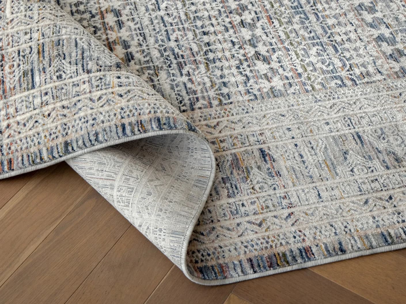 Natalia Sky carpets in sky and blue, shown in a product close-up view