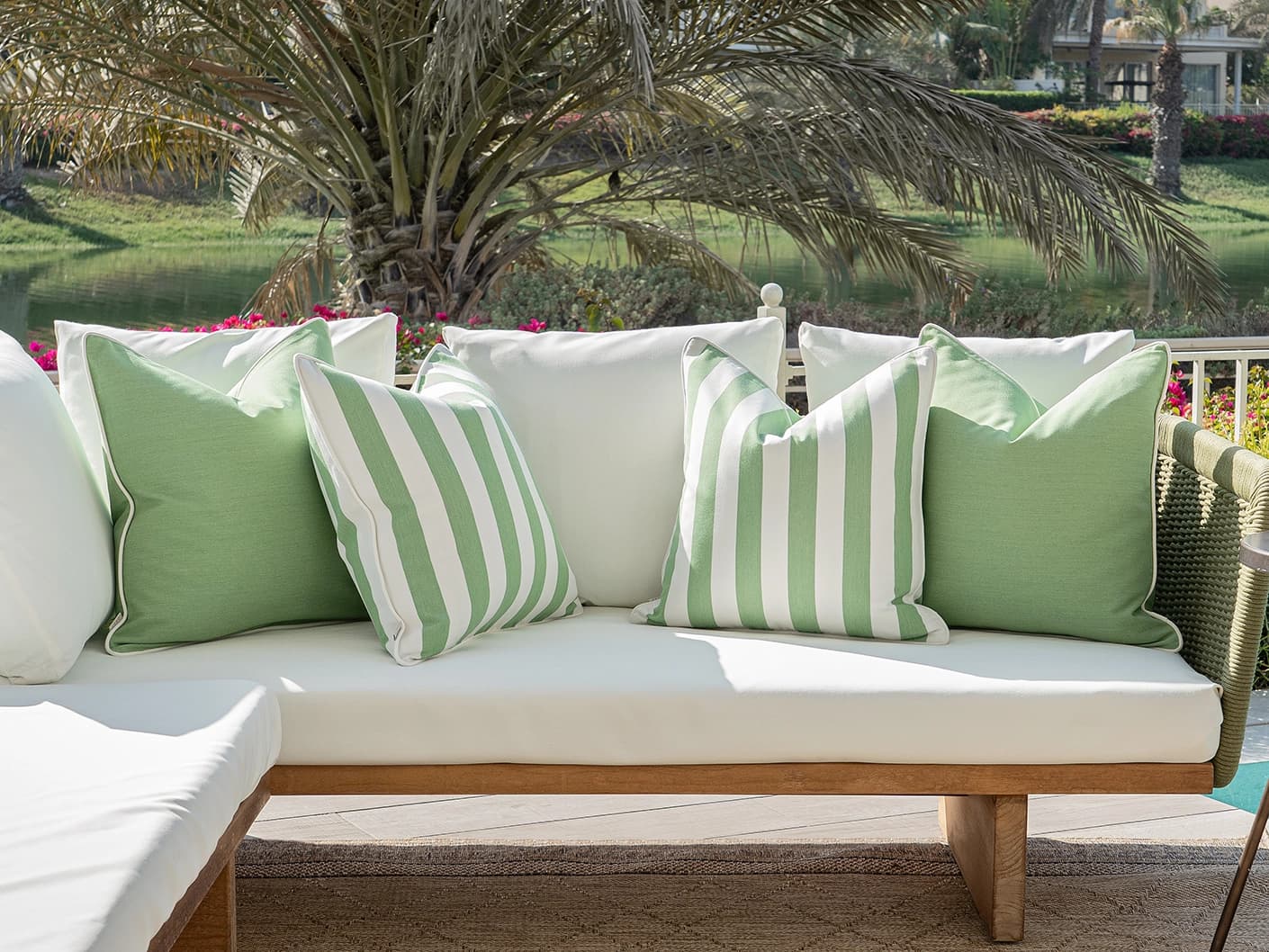 Nehal Bundle bundle cushions in green, shown in a lifestyle front view