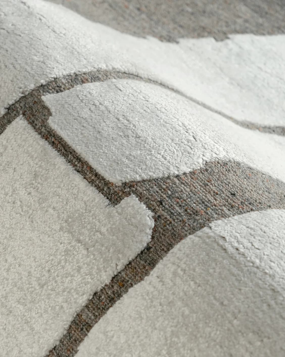 Nico Sandy carpet in ivory, grey and brown, shown in a product close-up as image 9
