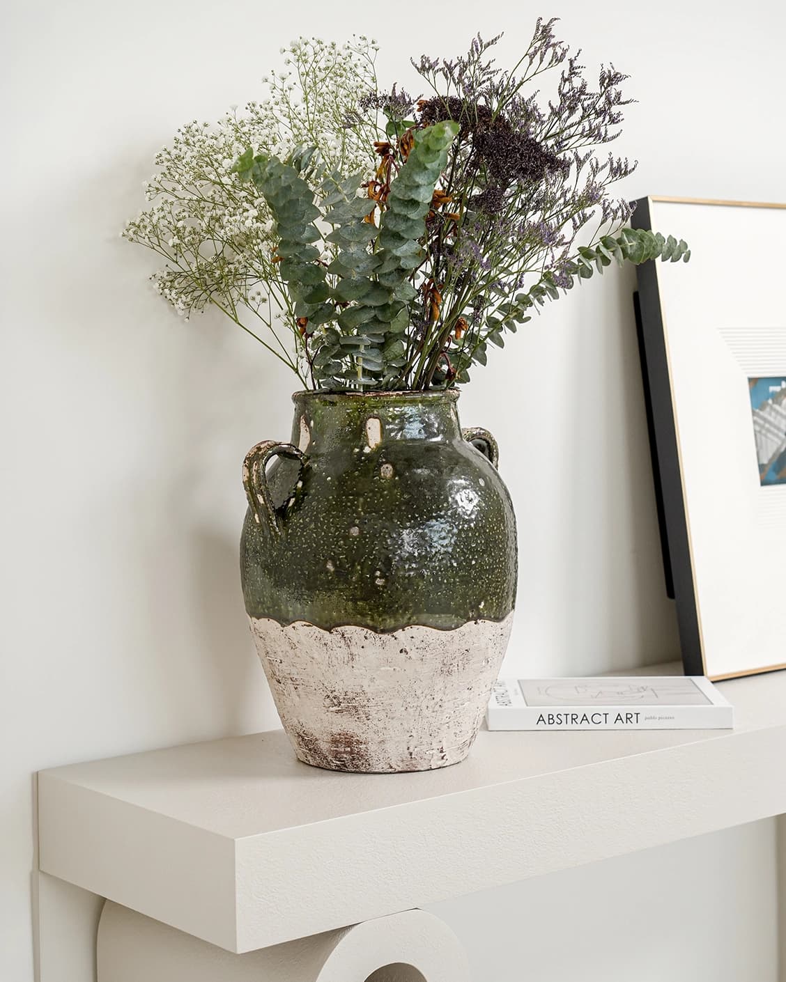Nilsa Terra vases in deep olive and green, shown in a lifestyle left view as image 2