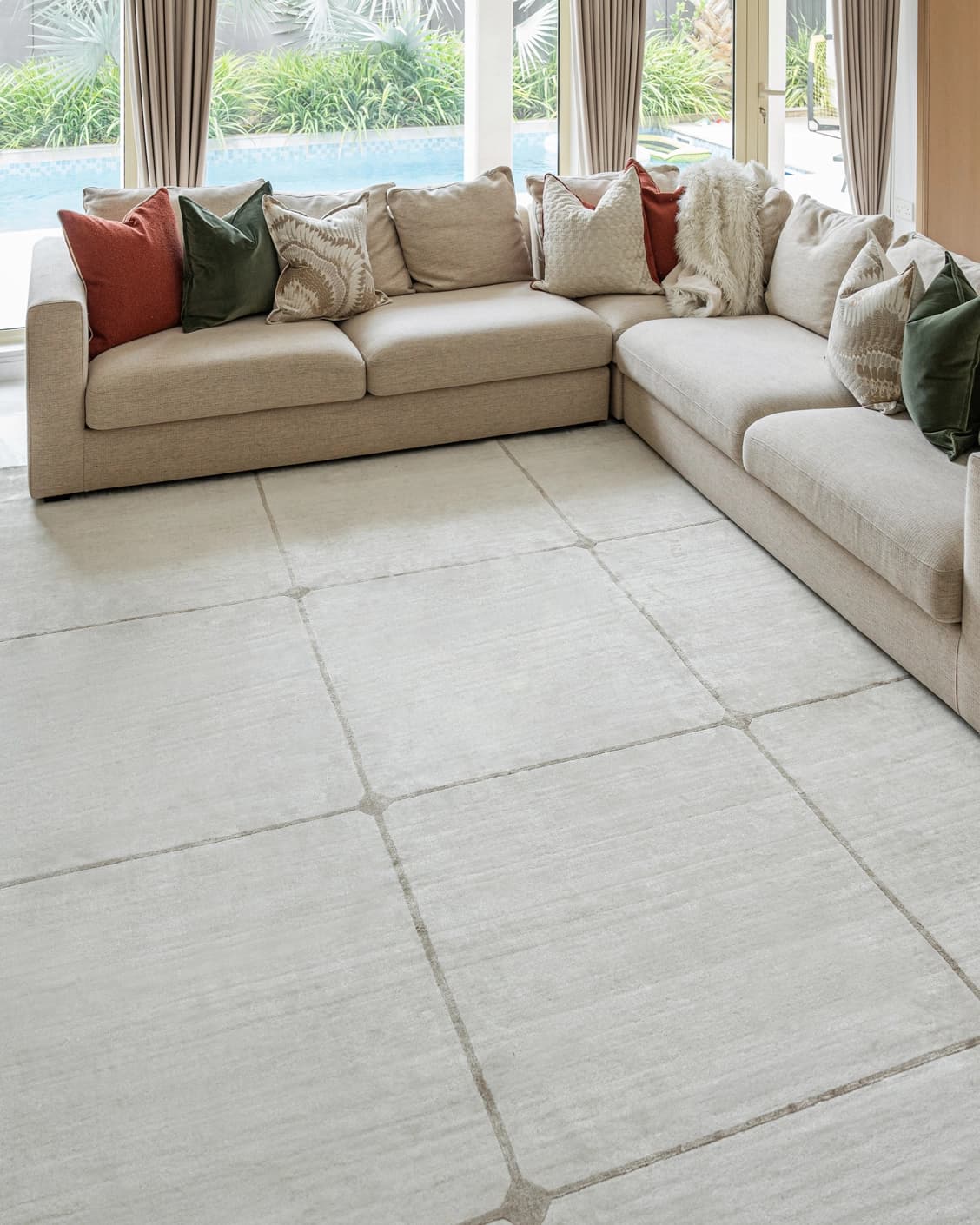 Noon Sadaf carpet in beige, shown in a lifestyle top view as image 8