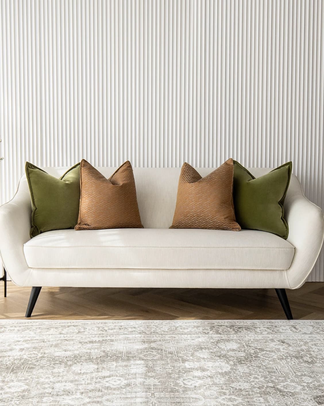 Octavia Bundle bundle - indoor in green and orange, shown in a lifestyle front view as image 1