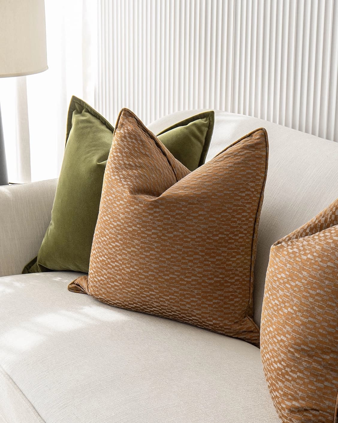 Octavia Bundle cushion in green and orange, shown in a product front view as image 5