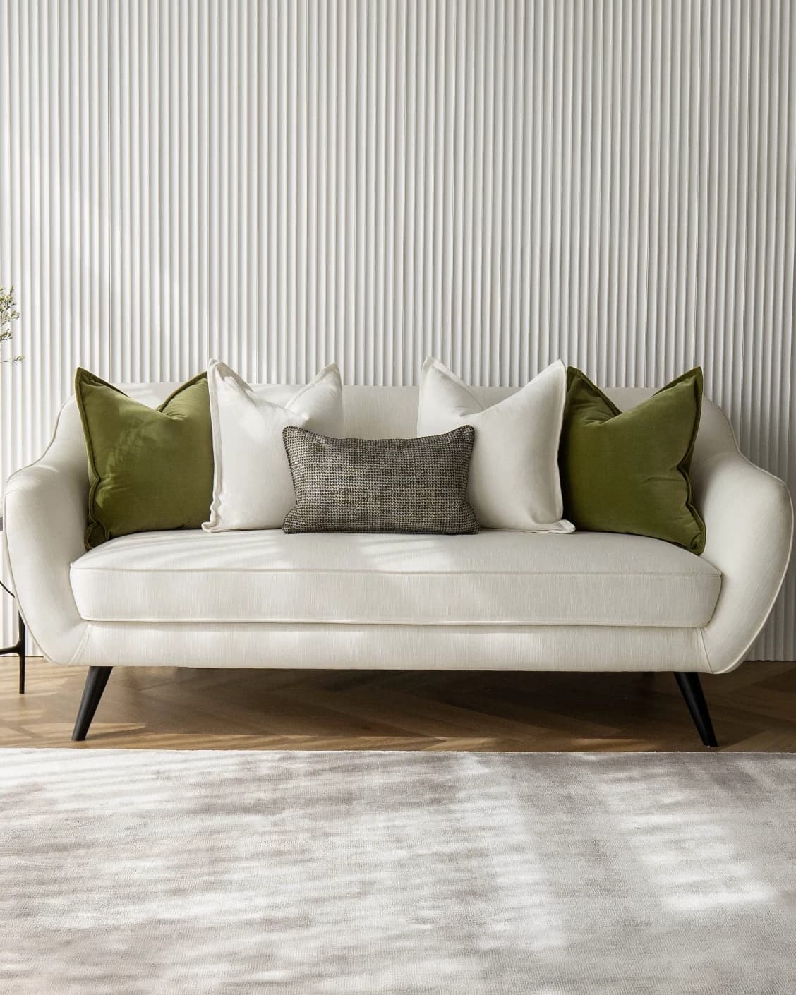 Oona Bundle bundle - indoor in white, green and black, shown in a lifestyle front view as image 1