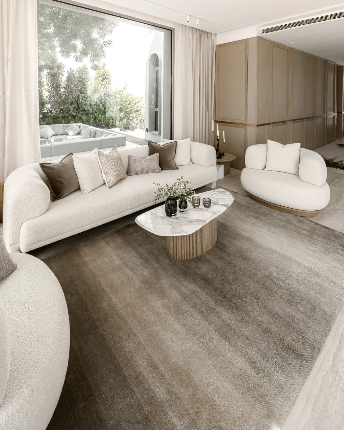 Oscar Ashton carpet in beige, shown in a lifestyle left view as image 5