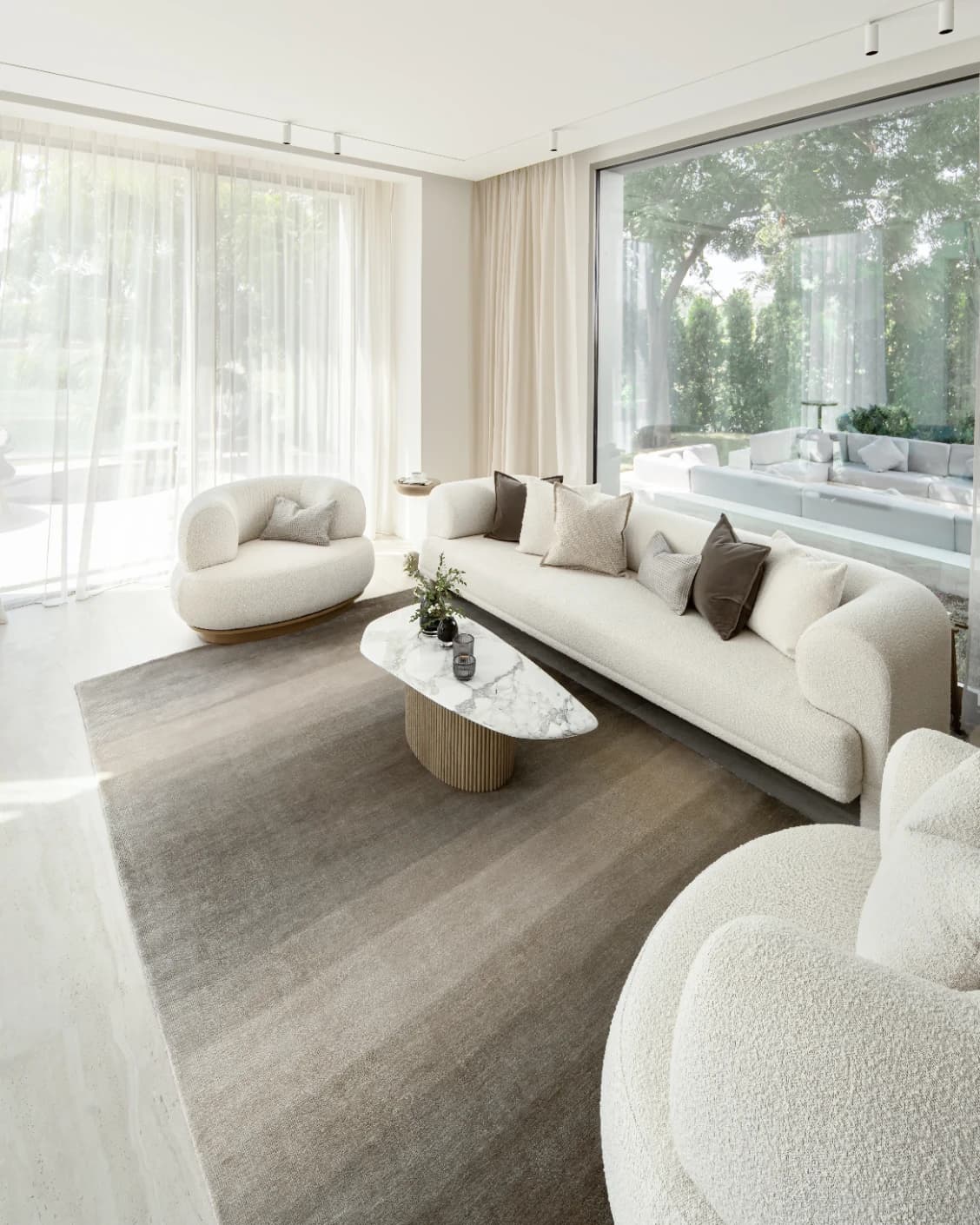 Oscar Ashton carpet in beige, shown in a lifestyle right view as image 8
