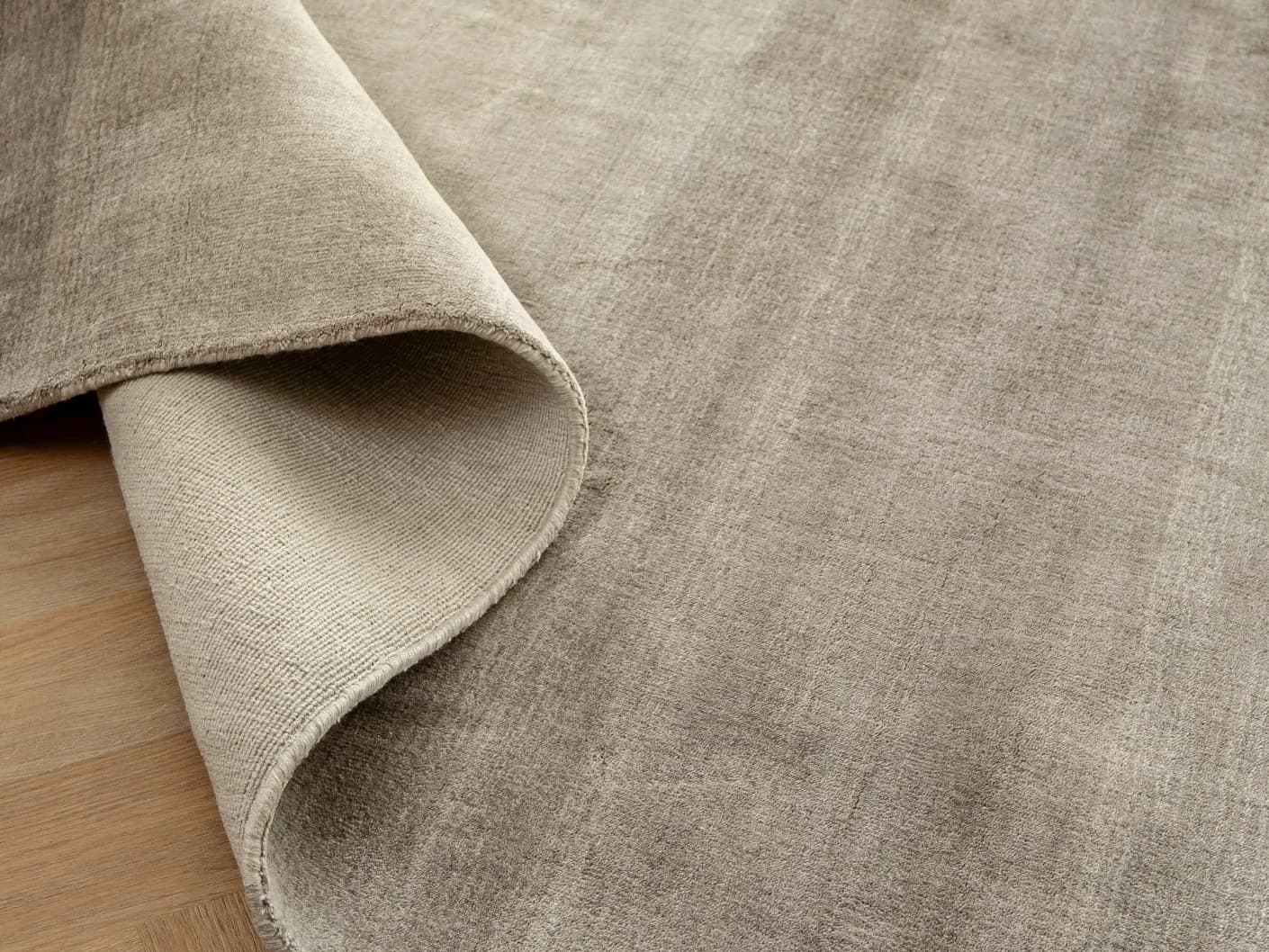 Oscar Ashton carpets in beige, shown in a product close-up view