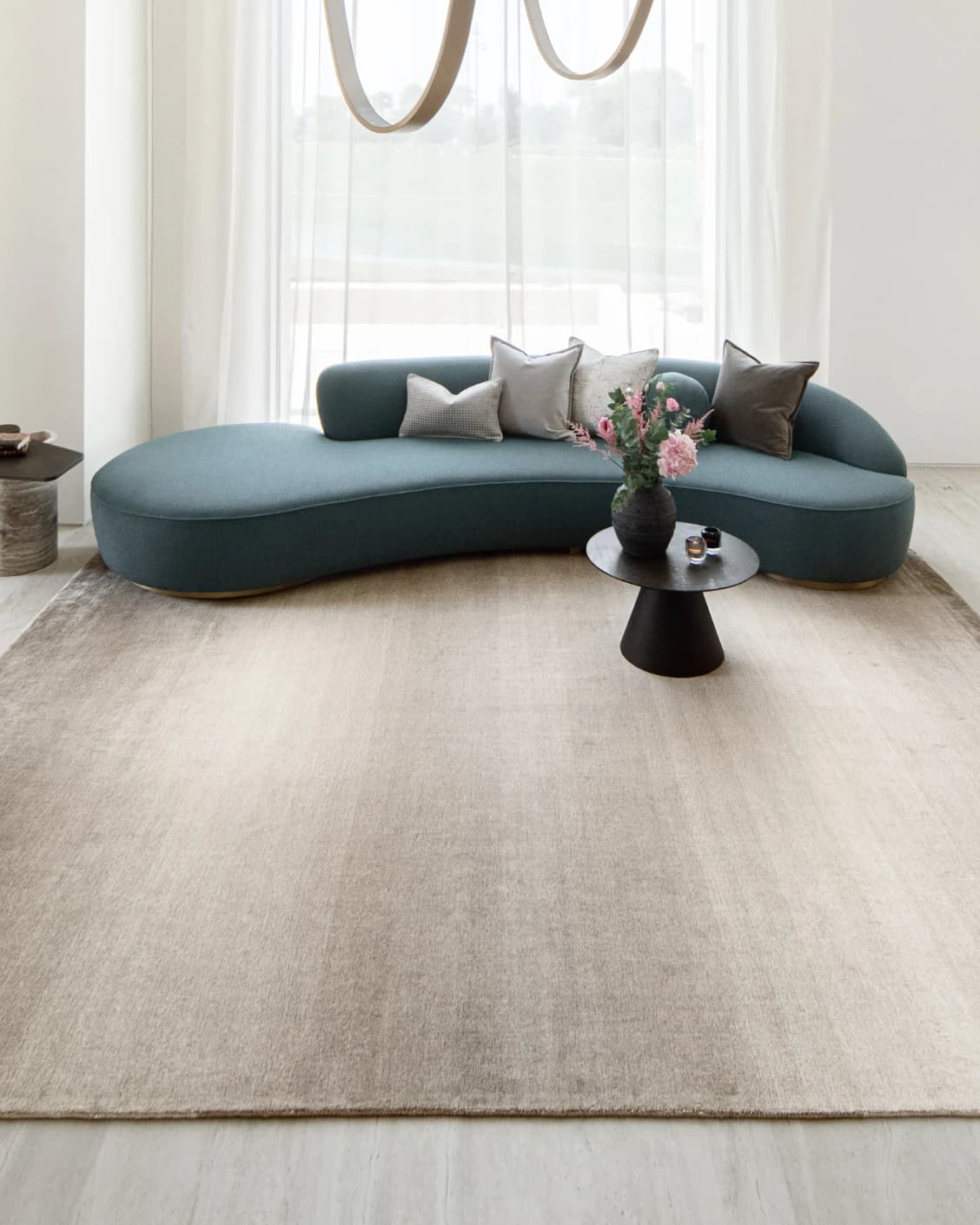 Oscar Dune carpet in beige, shown in a lifestyle front view as image 5
