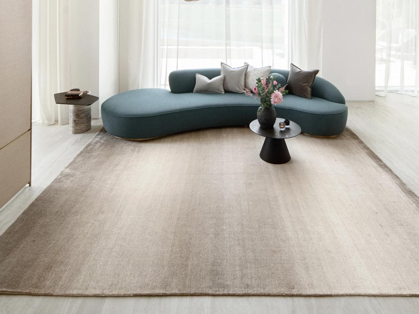Oscar Dune carpet in beige, shown in a lifestyle front view as image 5