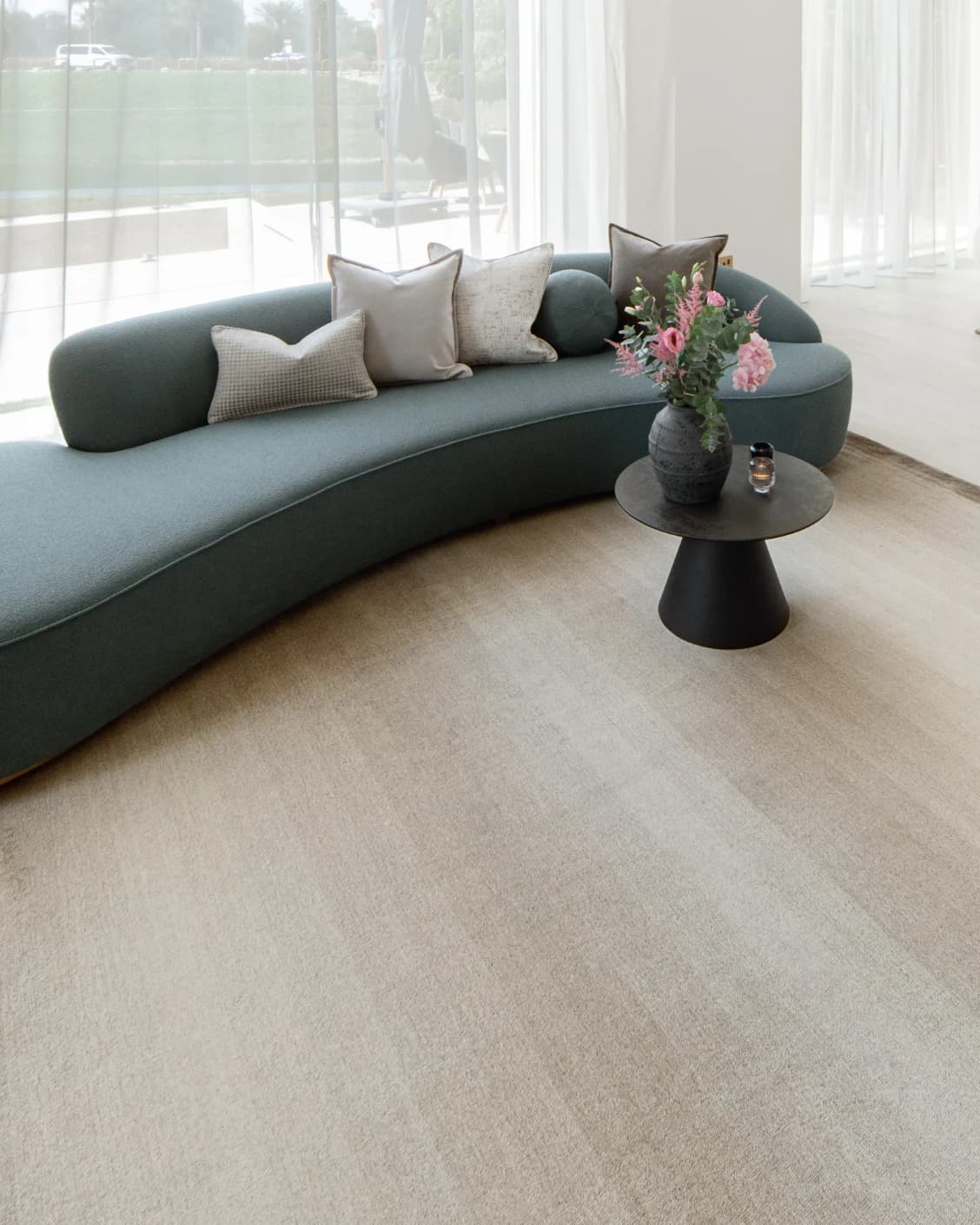Oscar Dune carpet in beige, shown in a lifestyle left view as image 6