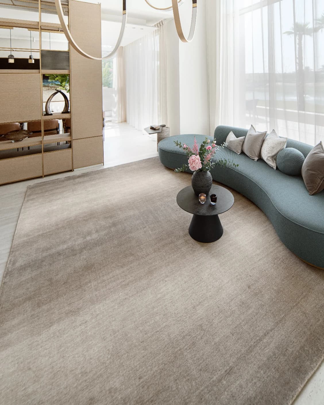 Oscar Dune carpet in beige, shown in a lifestyle right view as image 8
