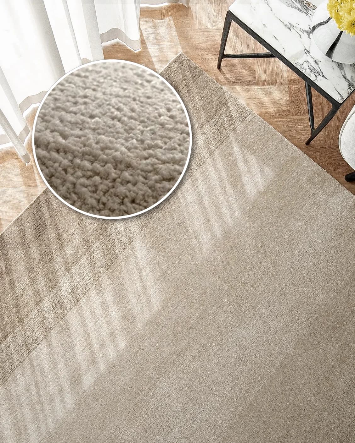 Oscar Dune carpet in beige, shown in a lifestyle top view as image 2