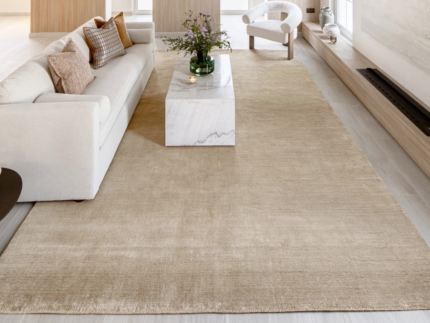 Oscar Sandy carpet in beige, shown in a lifestyle front view as image 4