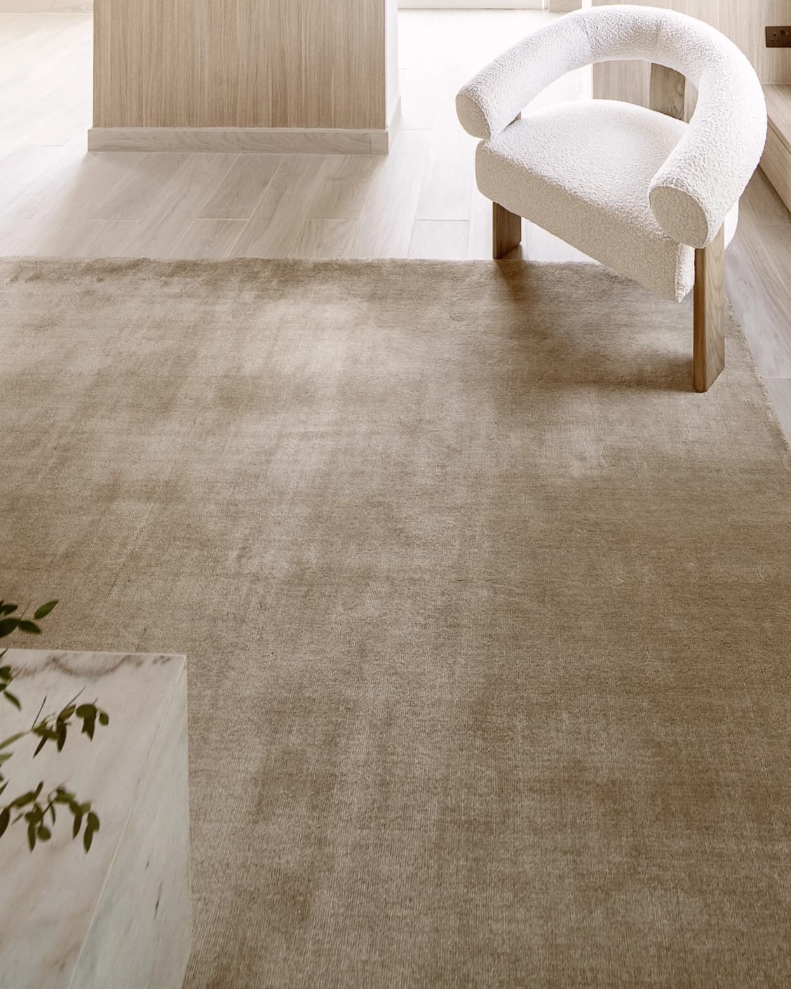 Oscar Sandy carpet in beige, shown in a lifestyle front view as image 6