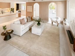 Oscar Sandy carpet in sandy and beige, shown in a lifestyle front view