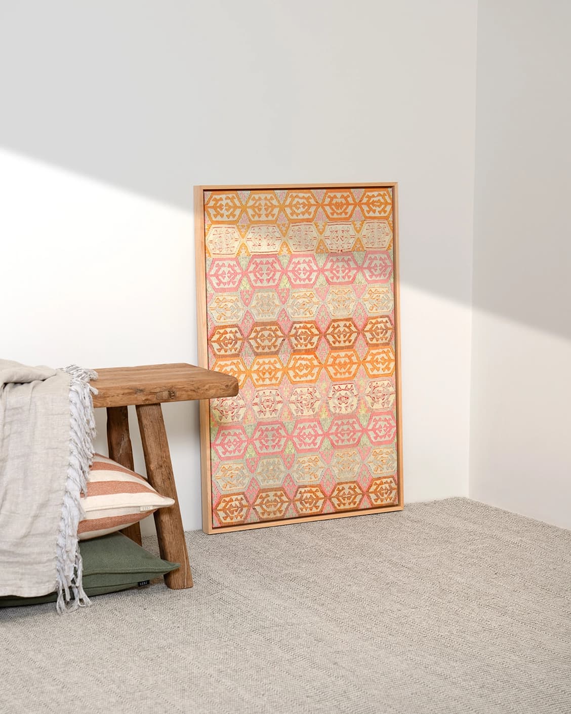Pastels canvas in pink, beige and orange, shown in a lifestyle left view as image 3