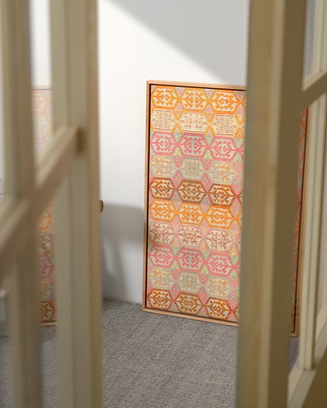 Pastels canvas in pink, beige and orange, shown in a lifestyle top view as image 4