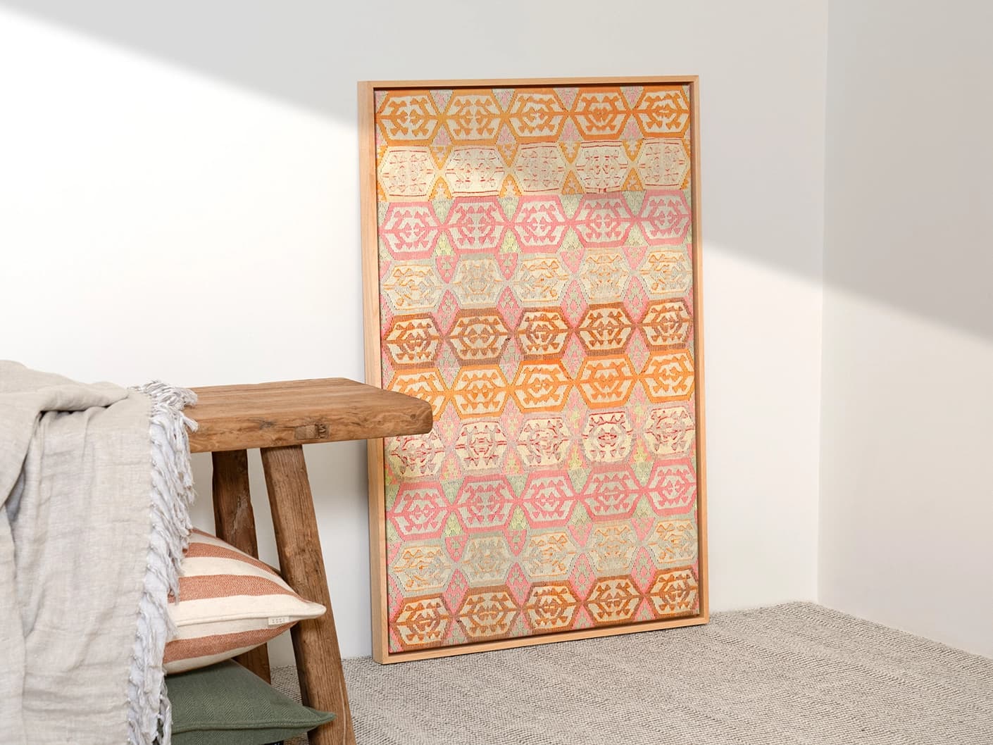 Pastels canvas in pink, beige and orange, shown in a lifestyle left view as image 3