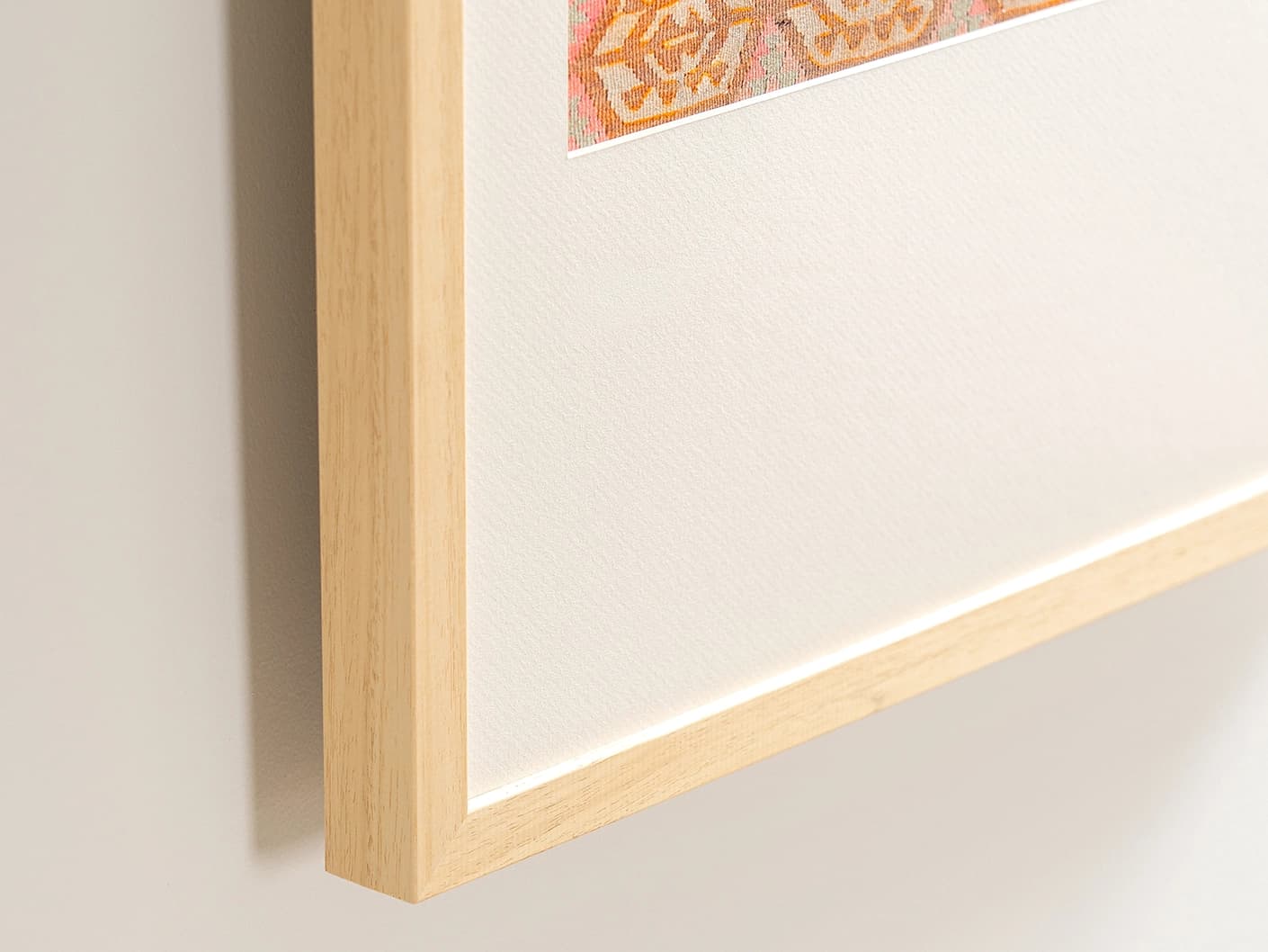Pastels fine art print in pink, beige and orange, shown in a lifestyle close-up view as image 1