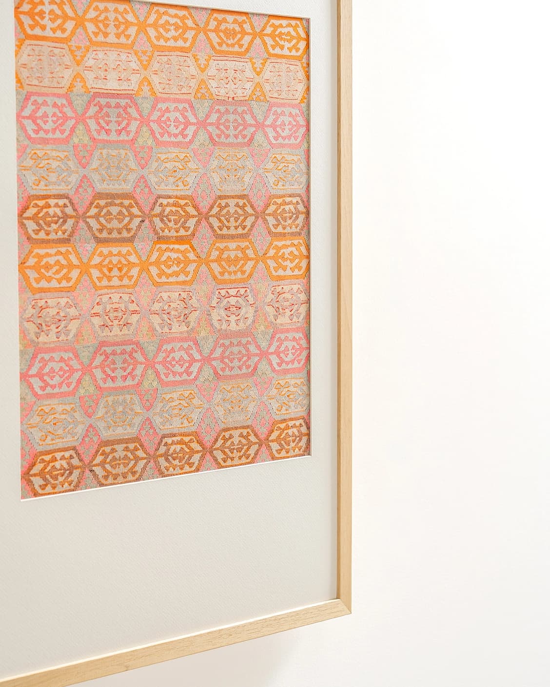 Pastels fine art print in pink, beige and orange, shown in a lifestyle close-up view as image 5