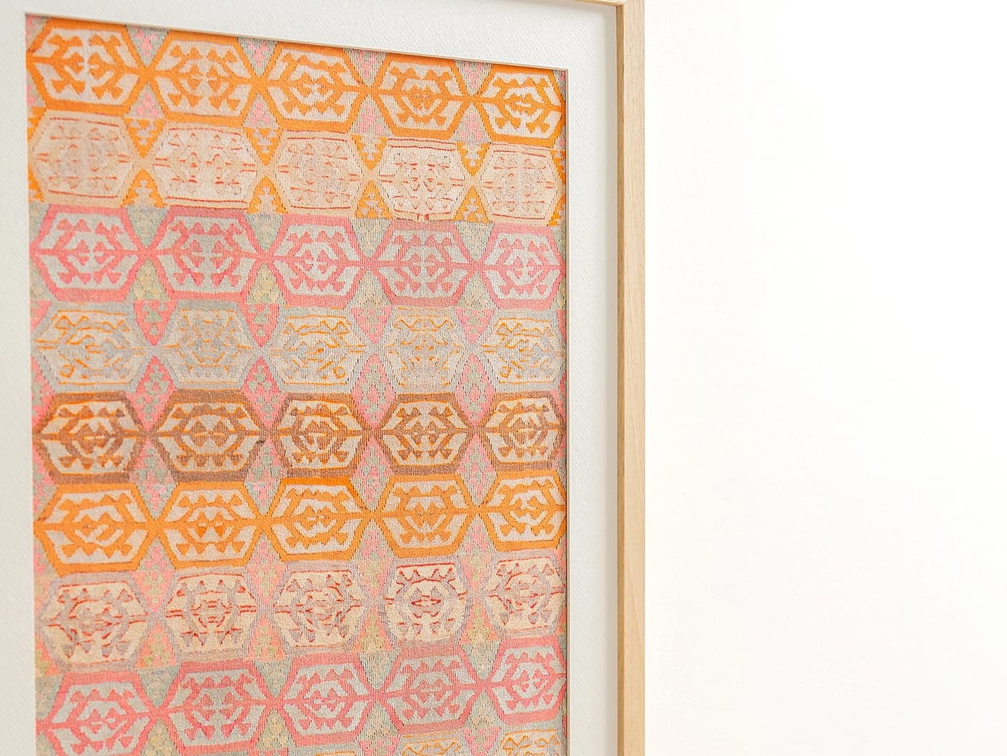 Pastels fine art print in pink, beige and orange, shown in a lifestyle close-up view as image 2