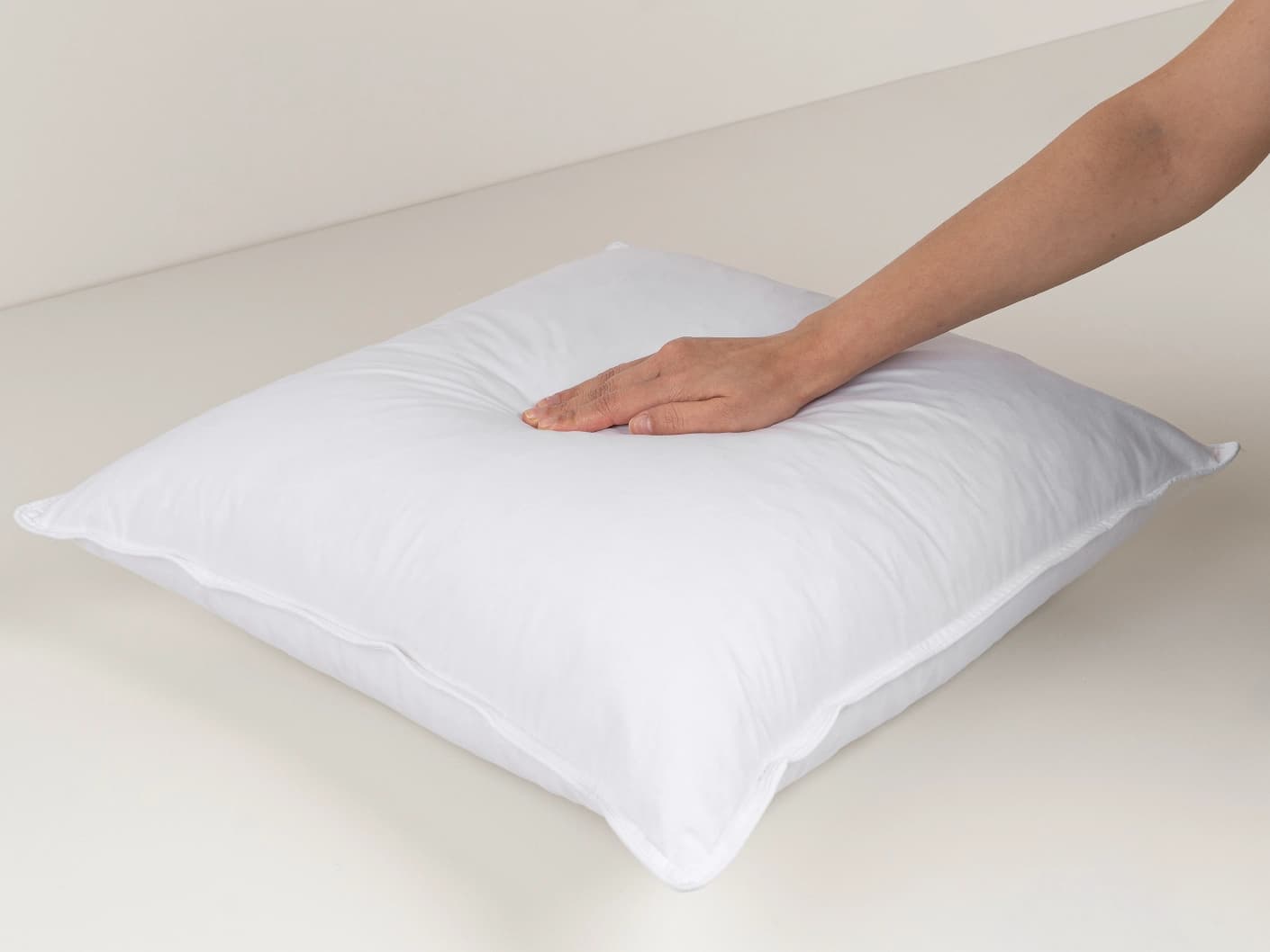 plush-feather-square-cushion-insert-white-lifestyle-left-view-4x