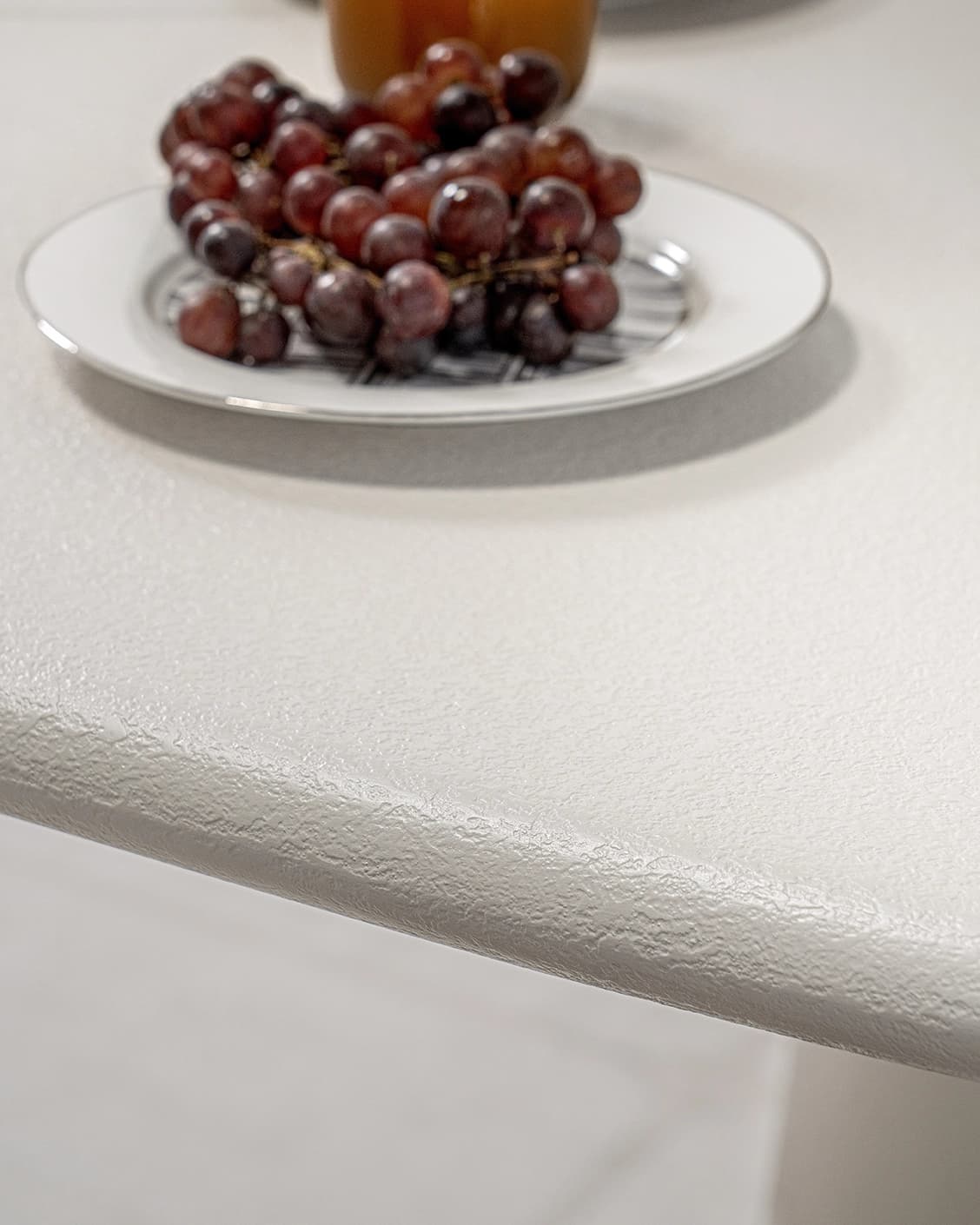 Ravenna Ivory Stone Dinning Table in soft ivory, stone and ivory, shown in a lifestyle close-up top view as image 5