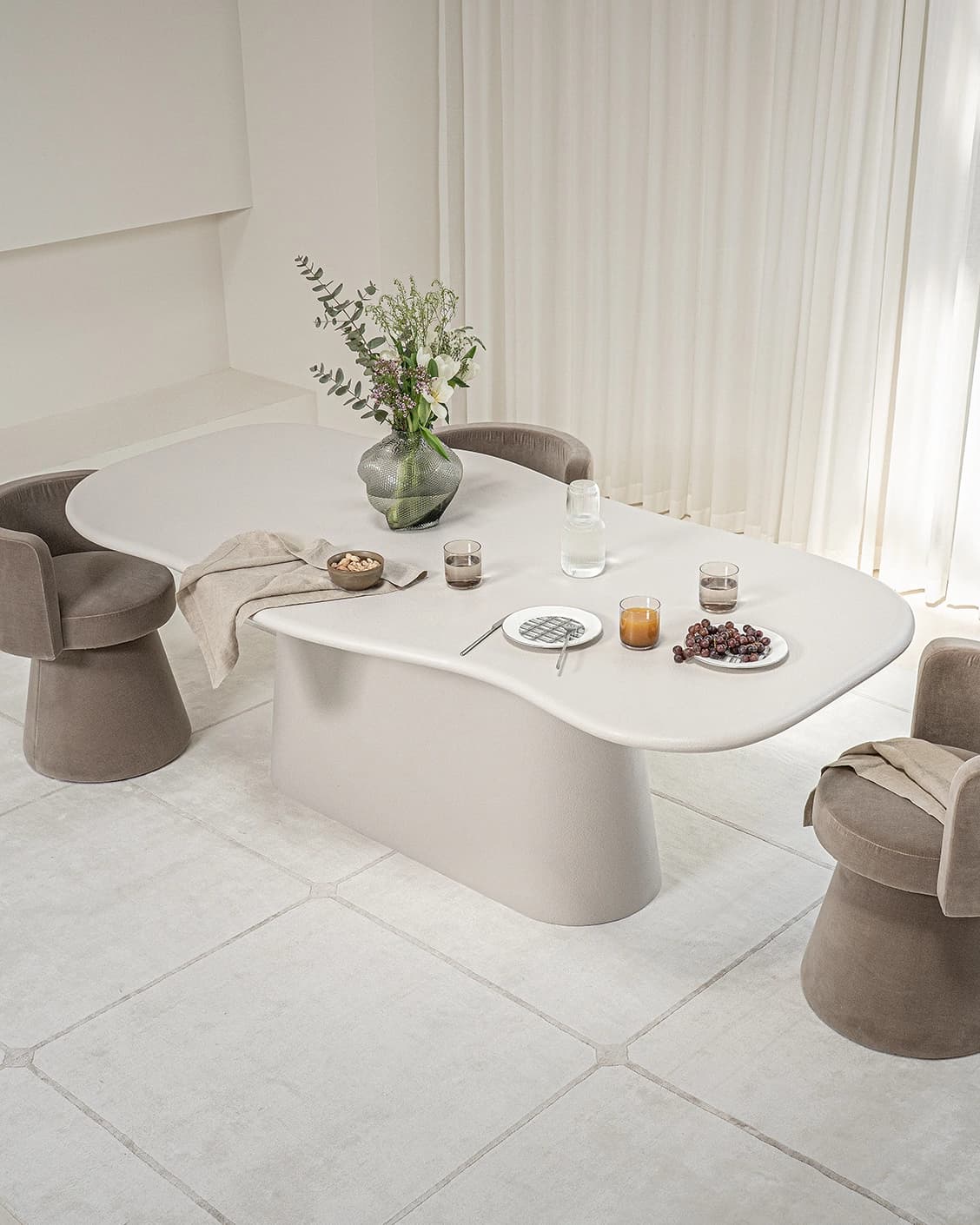 Ravenna Ivory Stone Dinning Table in soft ivory, stone and ivory, shown in a lifestyle right view as image 6