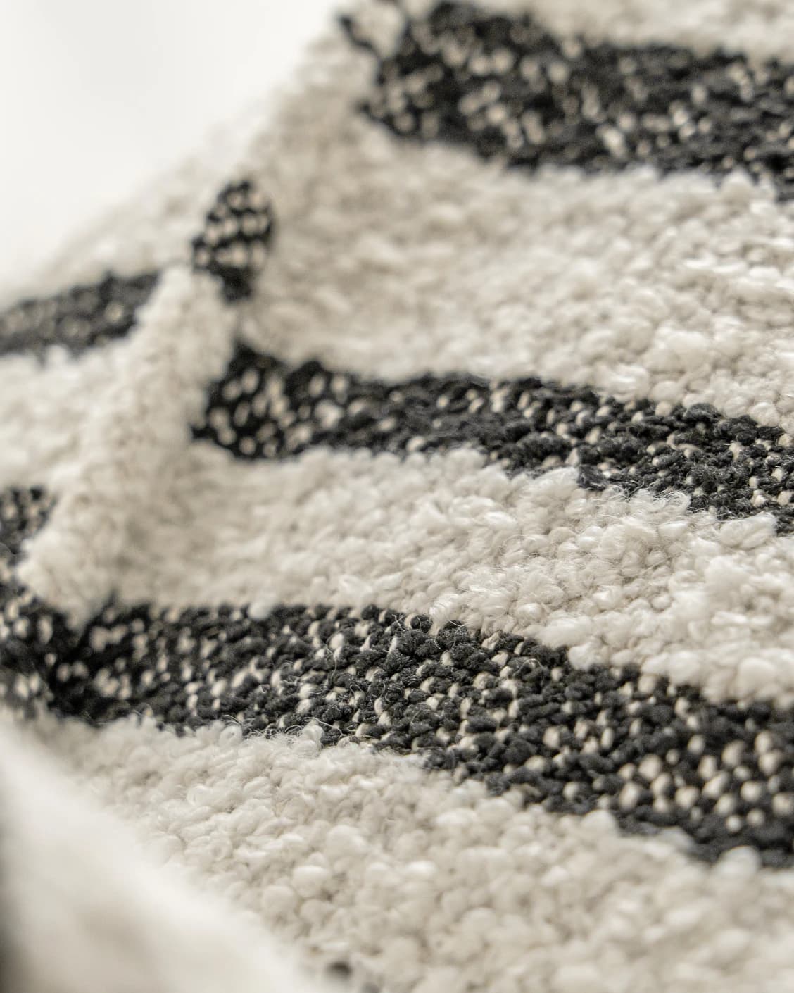 Raya Steele single - indoor in ivory and charcoal, shown in a product close-up as image 2