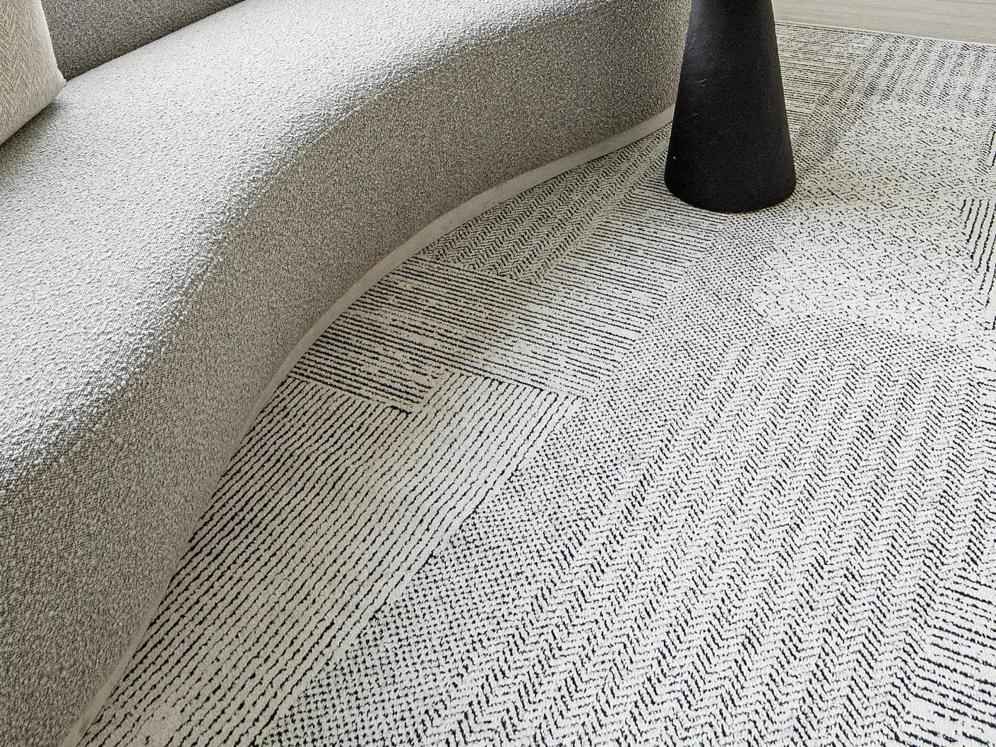 Renzo Dusty carpets in black and white, shown in a lifestyle close-up as image 3